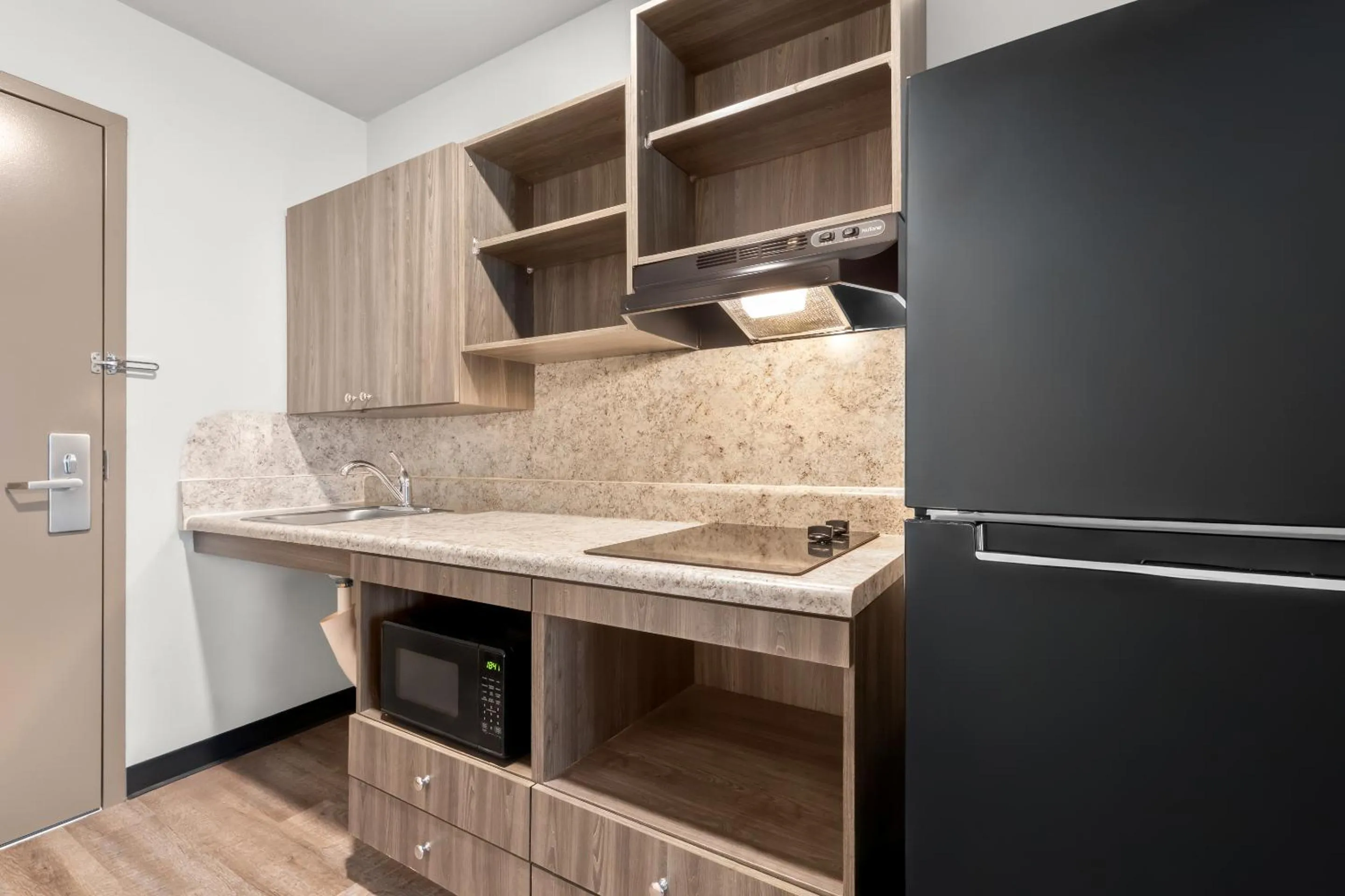 kitchen in WoodSpring Suites Atlanta Airport