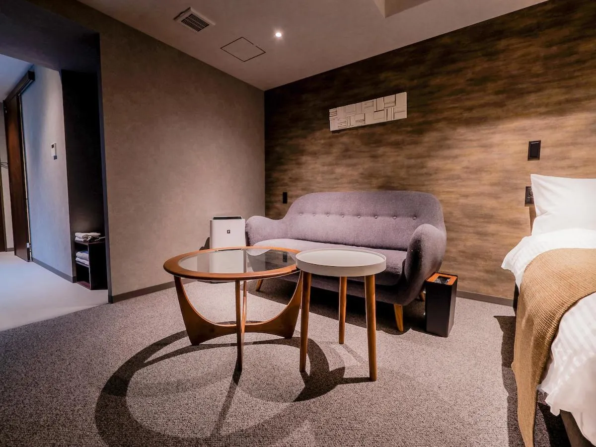 Bed in Randor Hotel Namba Osaka Suites