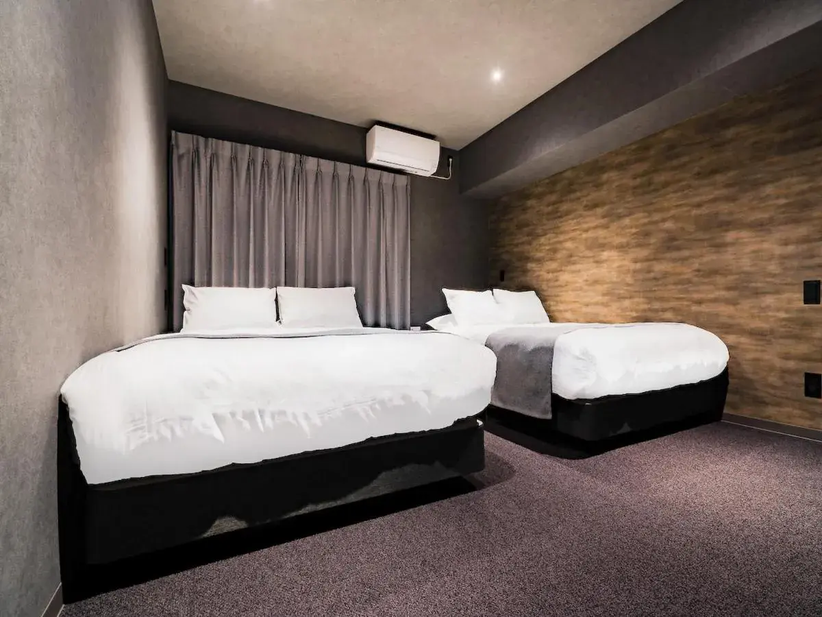 Bed in Randor Hotel Namba Osaka Suites Bed in Randor Hotel Namba Osaka Suites