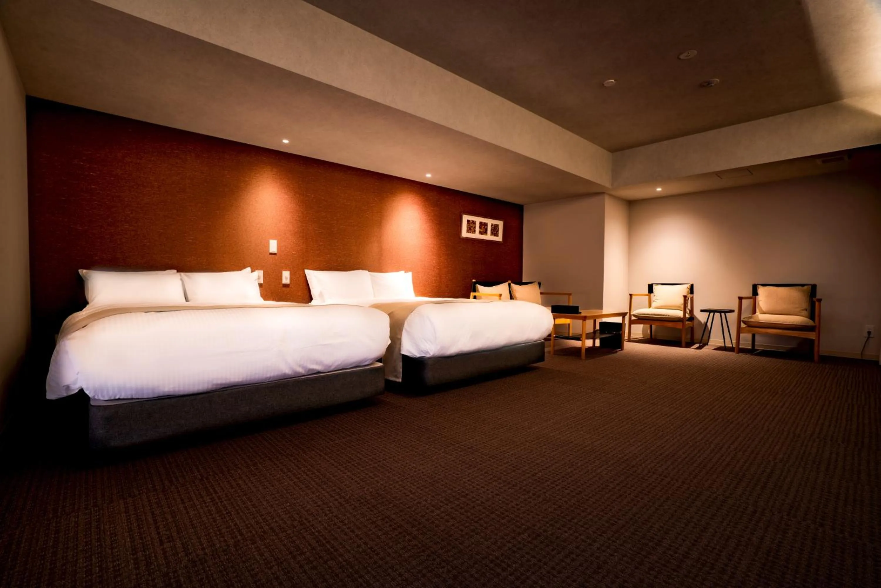 Photo of the whole room, Bed in Randor Hotel Namba Osaka Suites