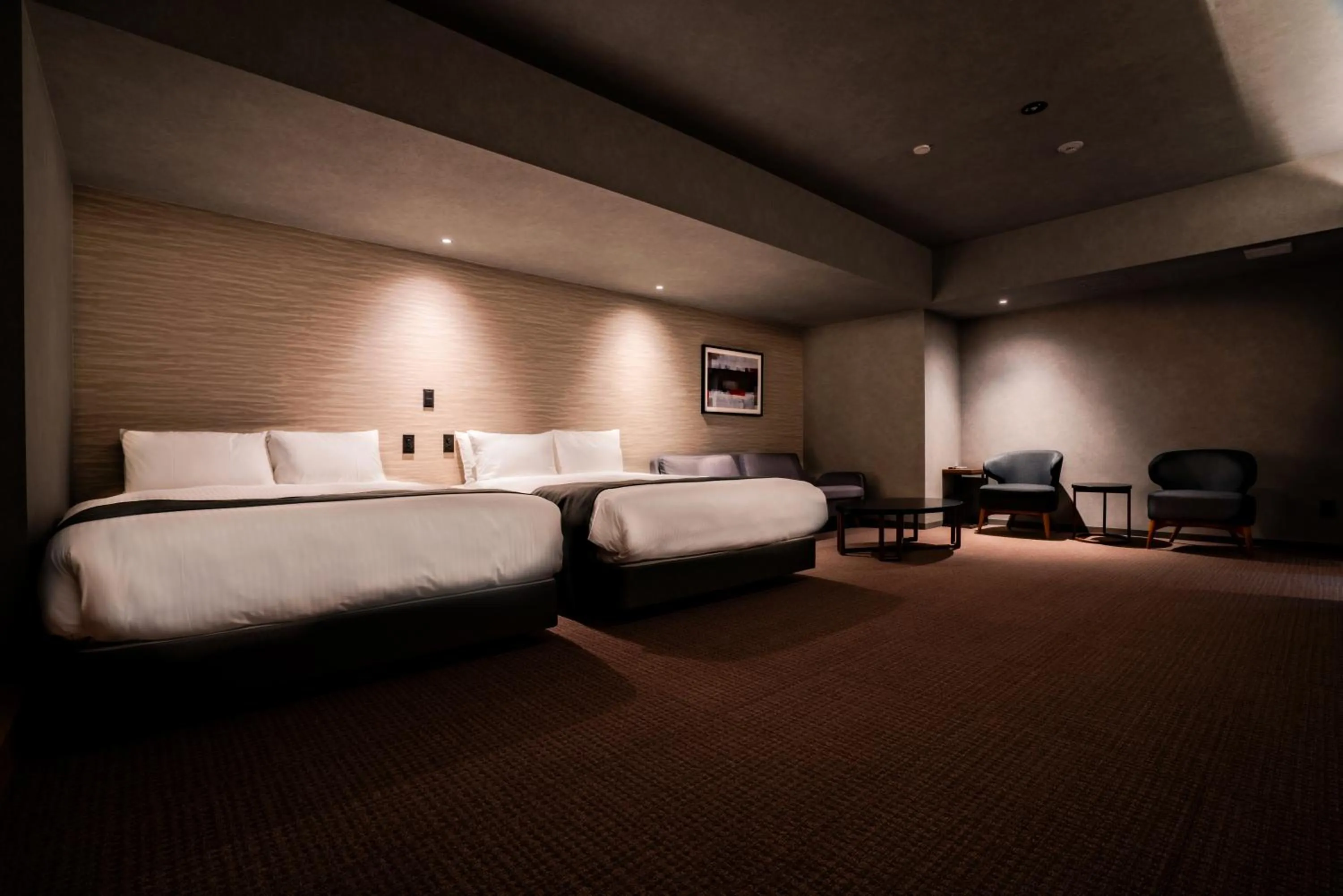 Photo of the whole room, Bed in Randor Hotel Namba Osaka Suites