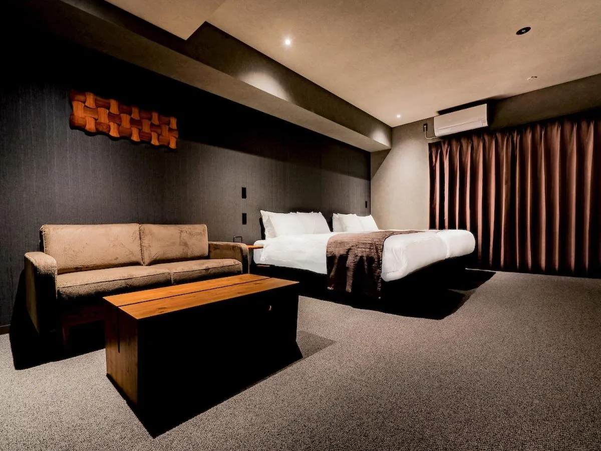 Bed in Randor Hotel Namba Osaka Suites