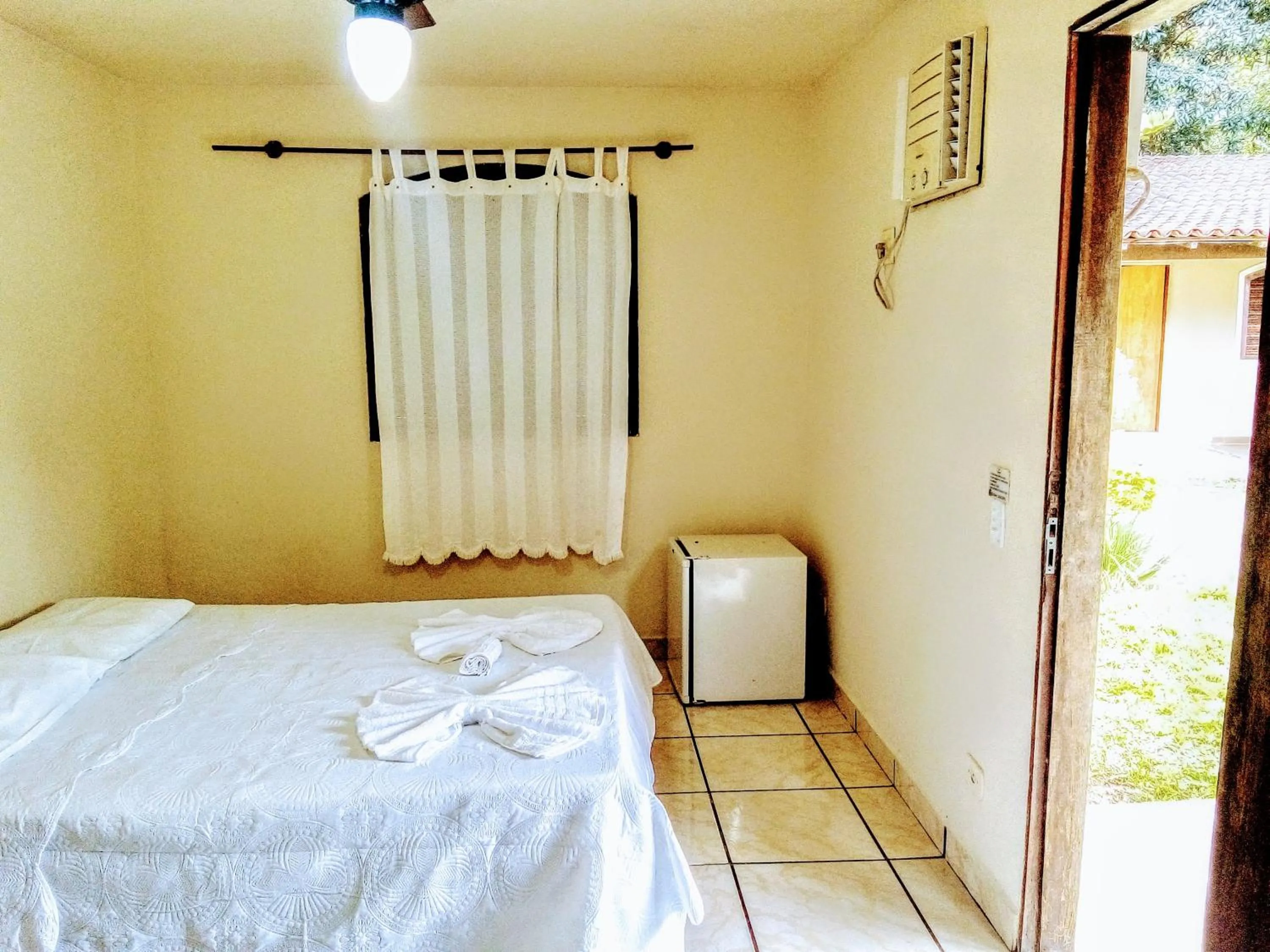 Bed in Pousada Thamalu