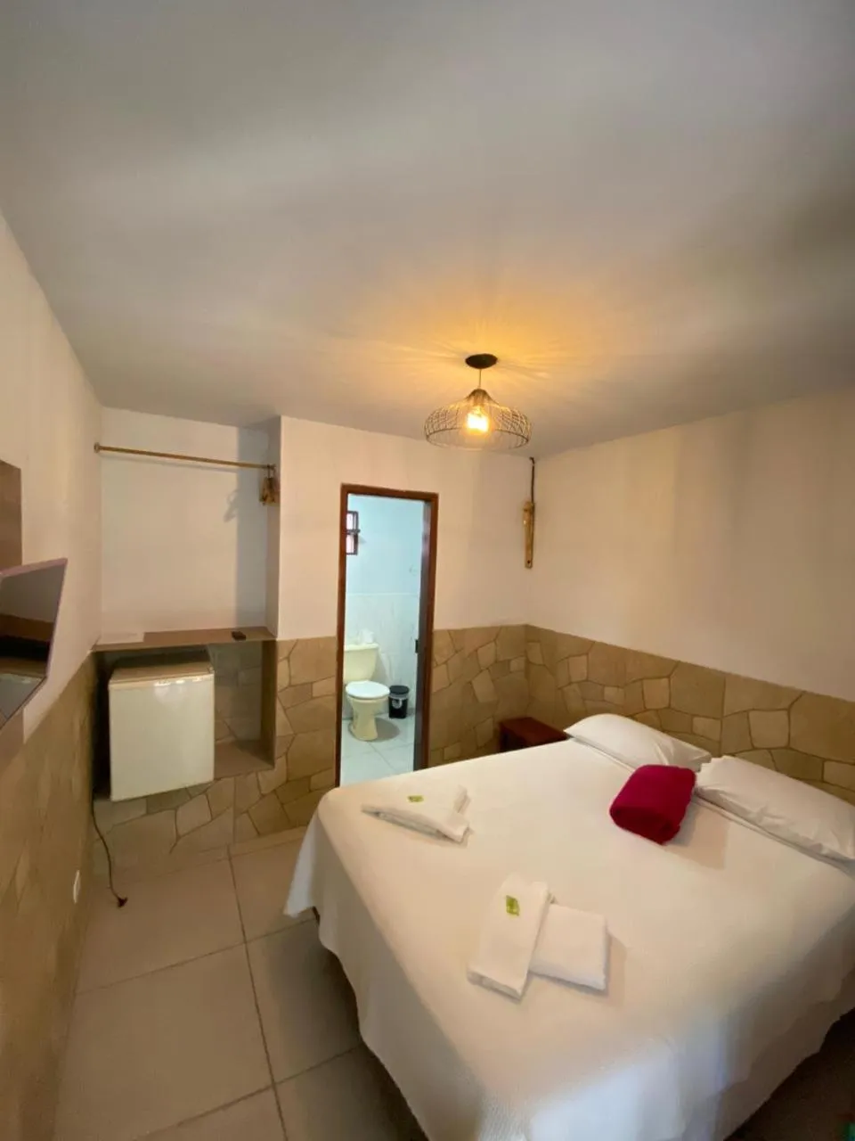 Bed in Pousada Thamalu