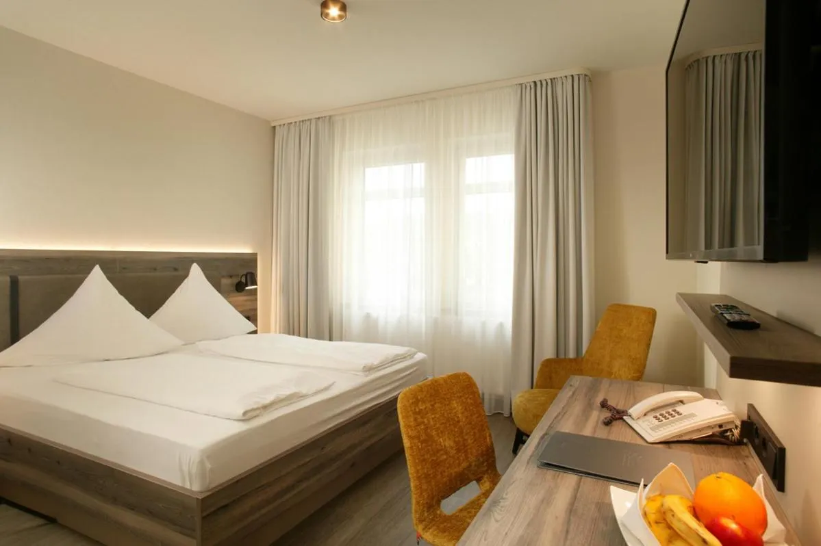 Photo of the whole room, Bed in Hotel Sonne Garni