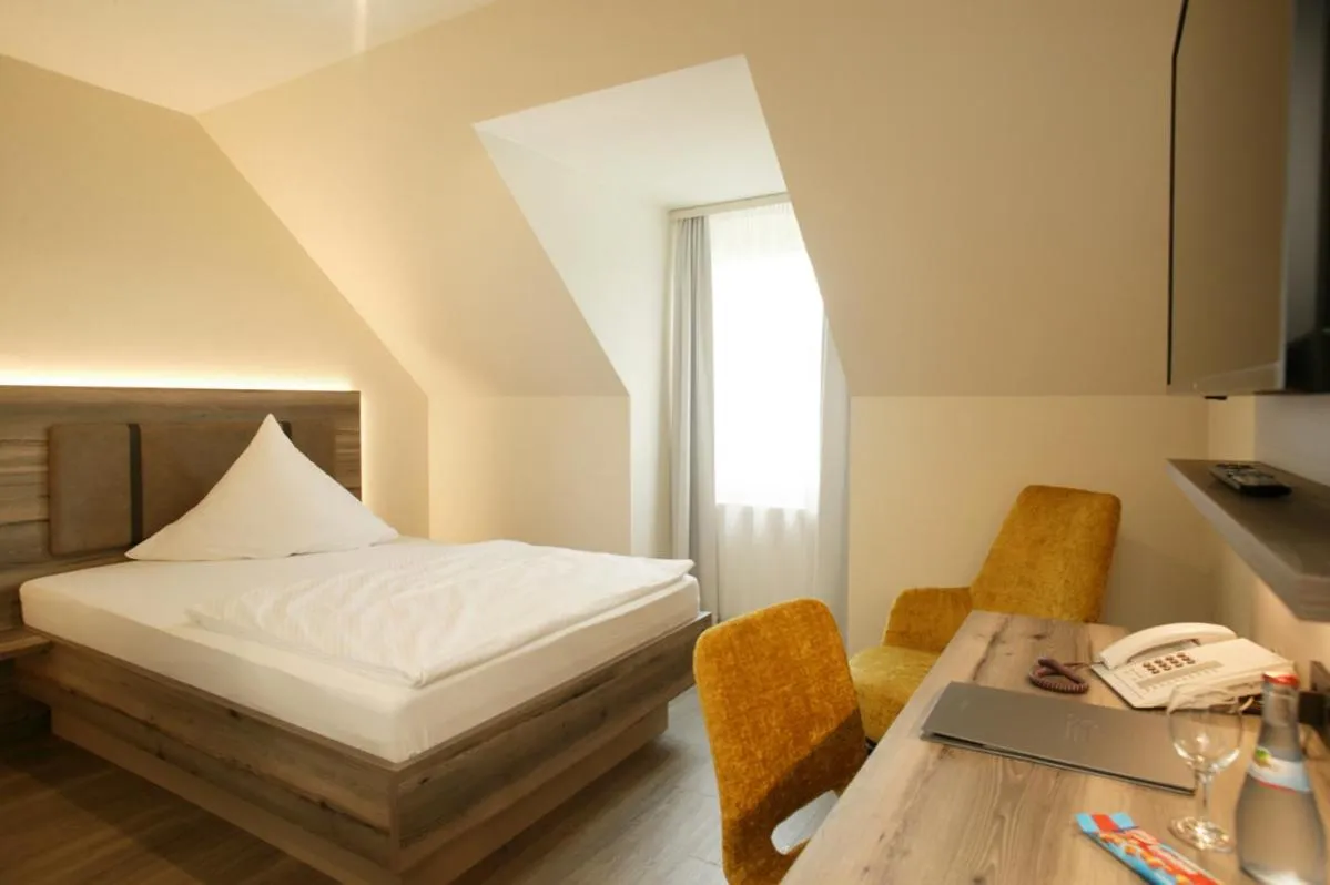 Photo of the whole room, Bed in Hotel Sonne Garni