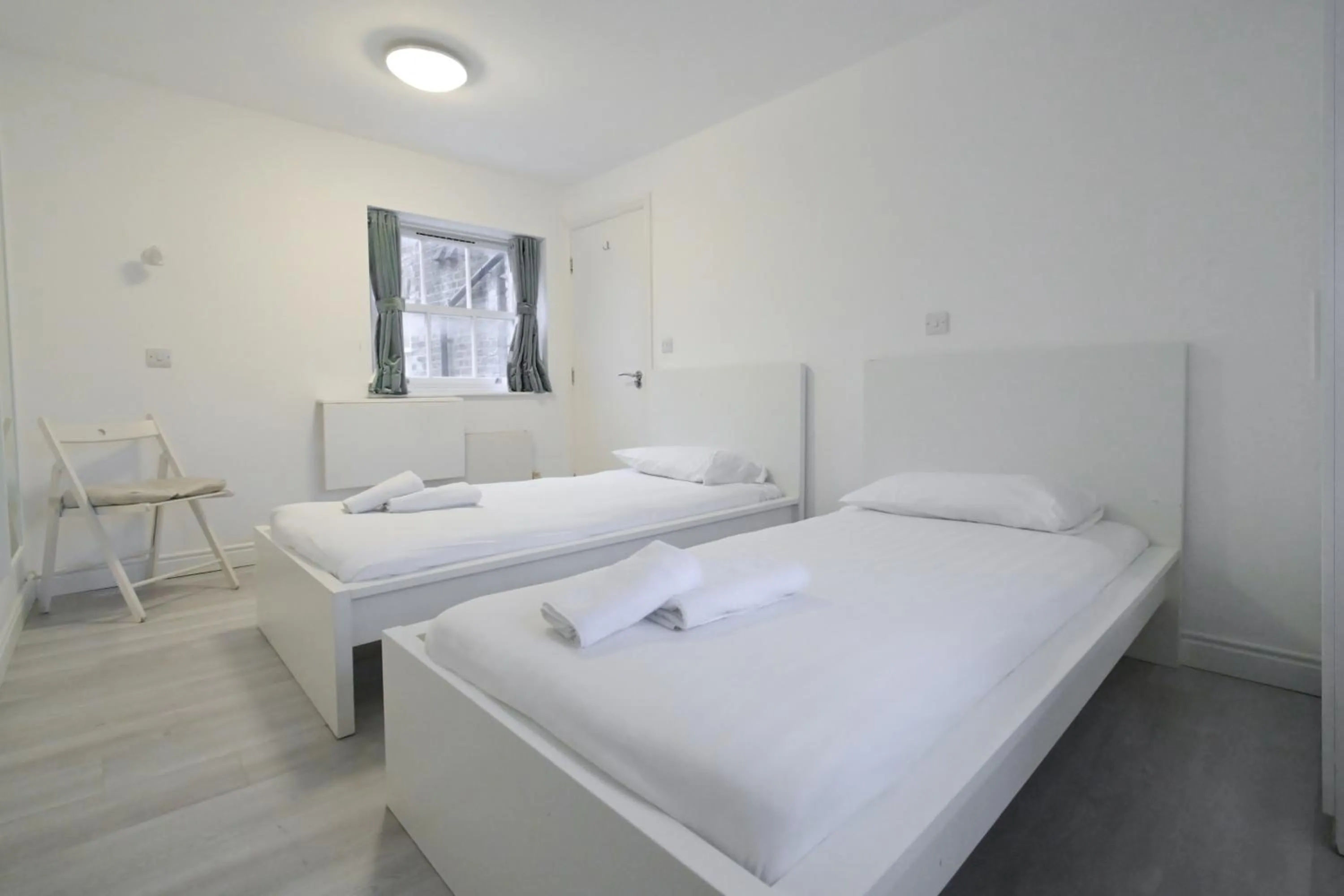 Bed in Charlotte Street Rooms by News Hotel