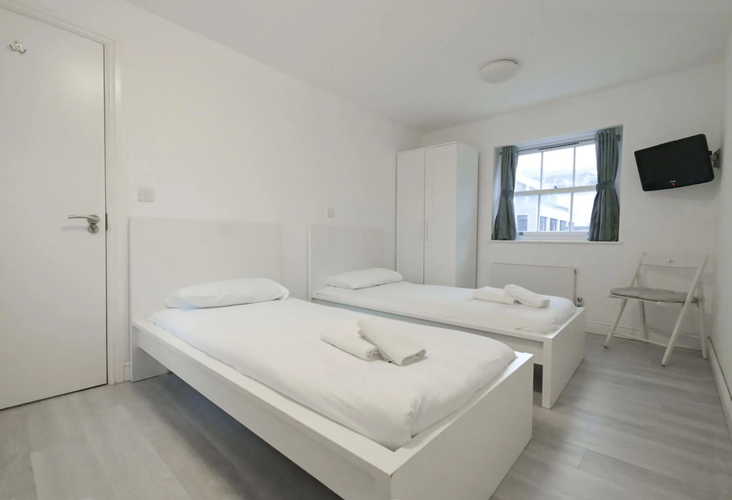 Bed in Charlotte Street Rooms by News Hotel