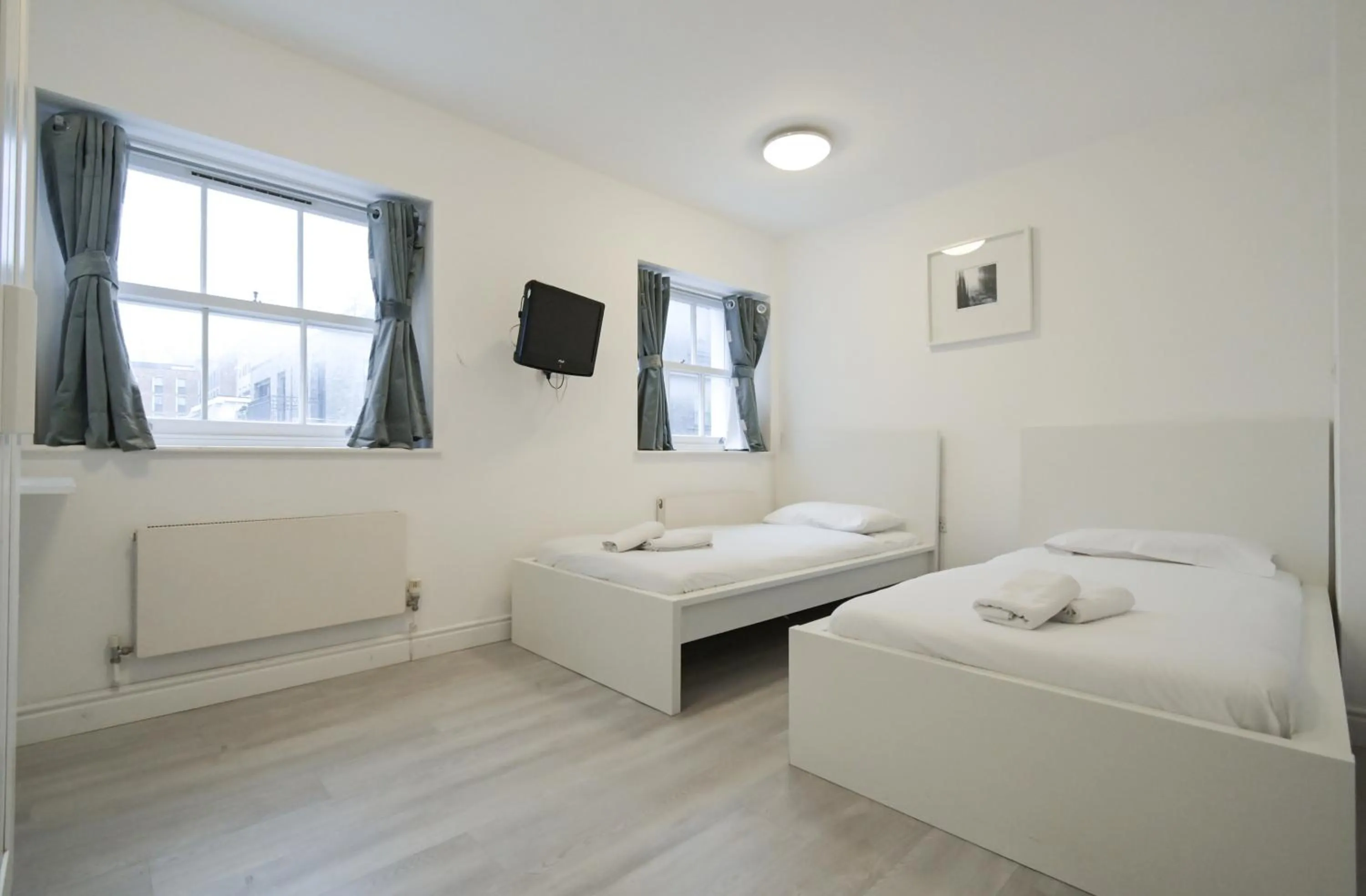 Bed in Charlotte Street Rooms by News Hotel