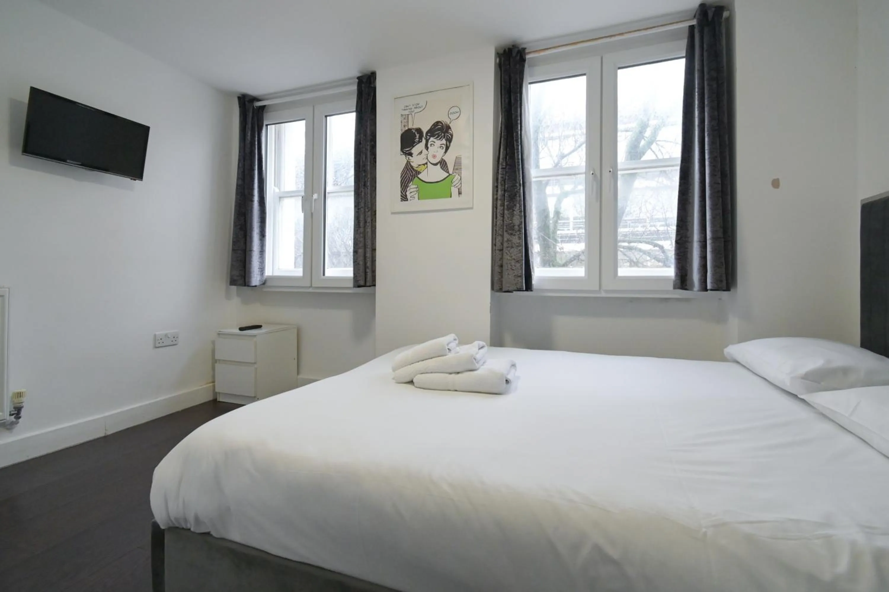 Bed in Charlotte Street Rooms by News Hotel