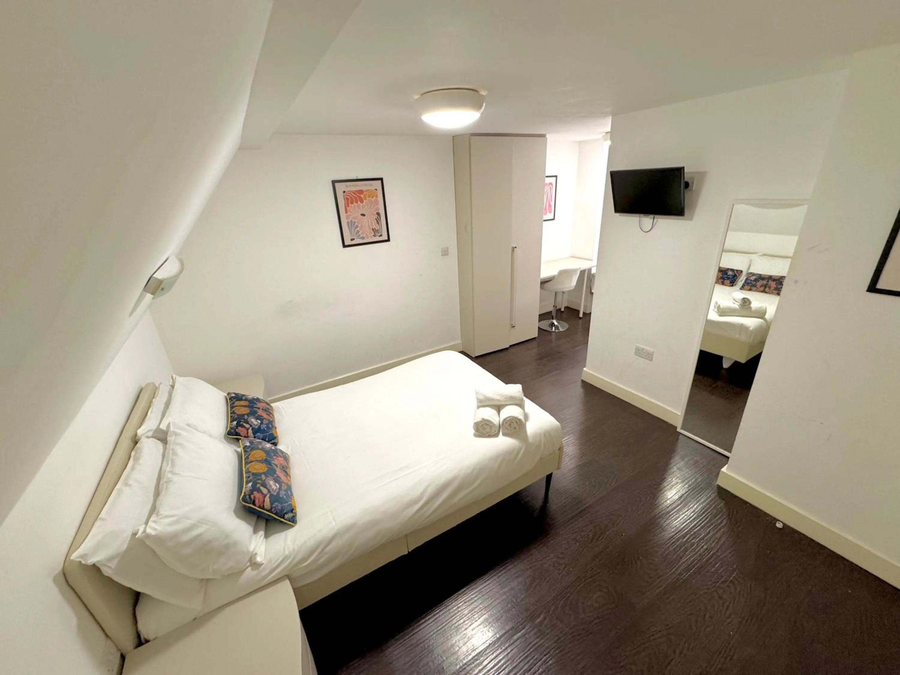 Bed in Charlotte Street Rooms by News Hotel