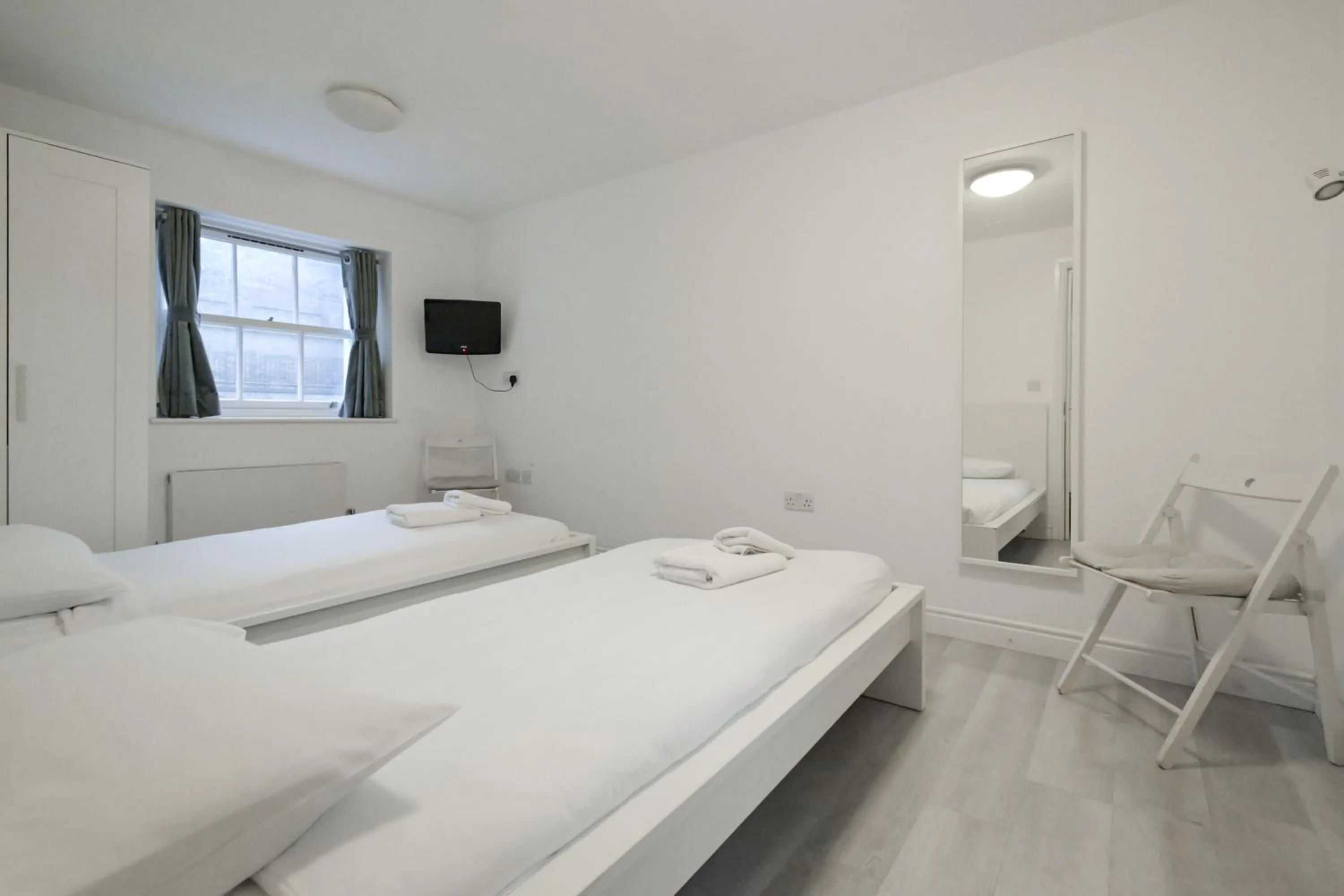 Bed in Charlotte Street Rooms by News Hotel