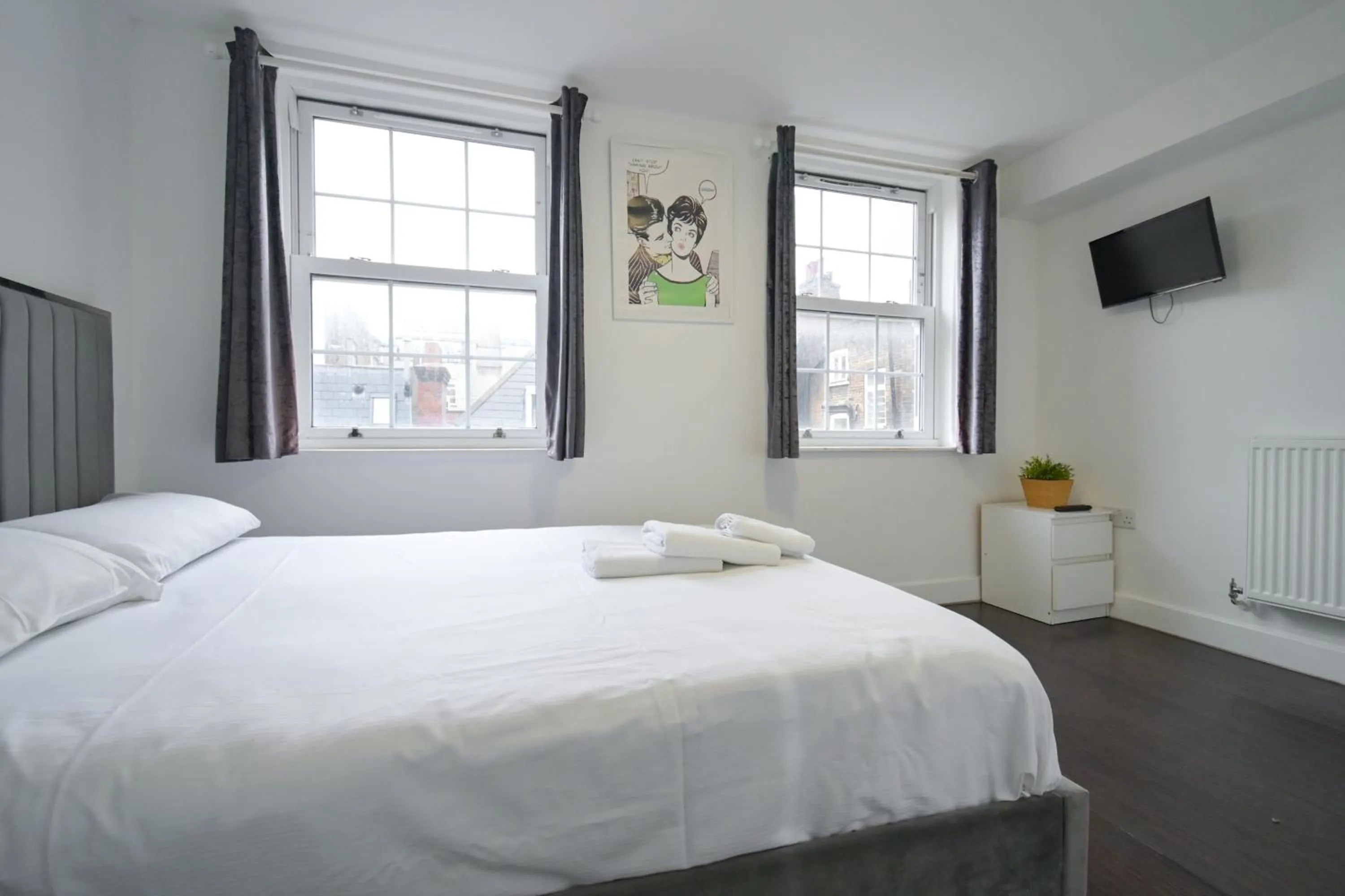 Bed in Charlotte Street Rooms by News Hotel