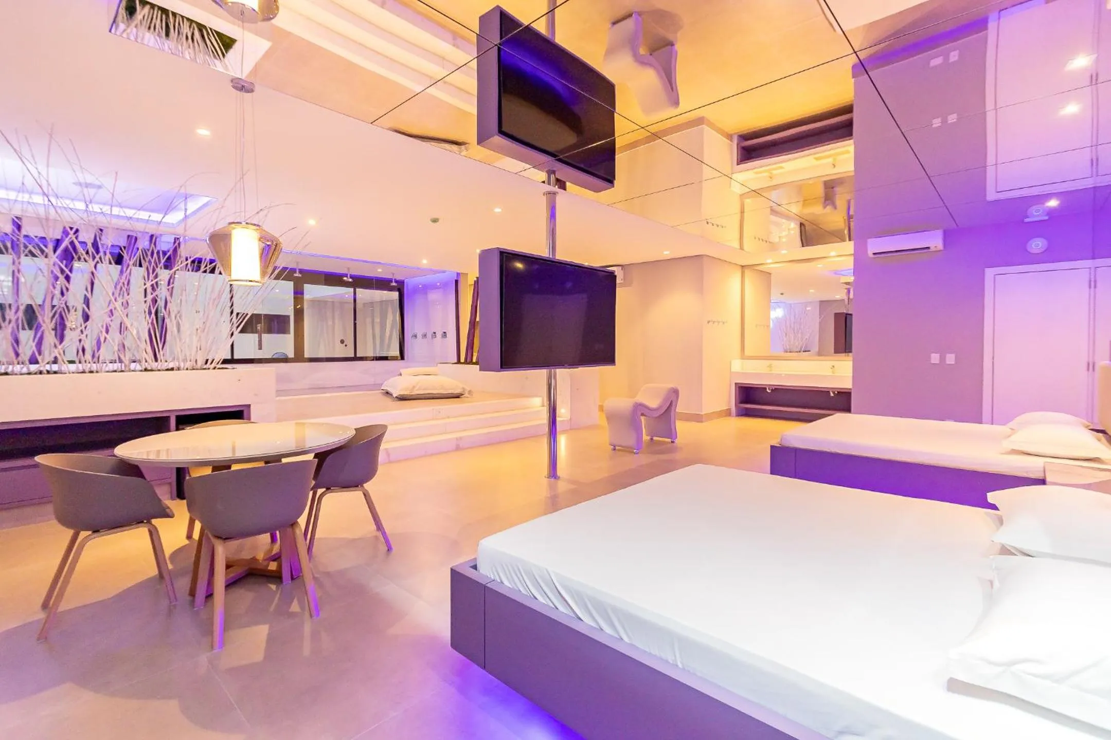 Communal lounge/ TV room, Bed in Poeme Motel by Drops