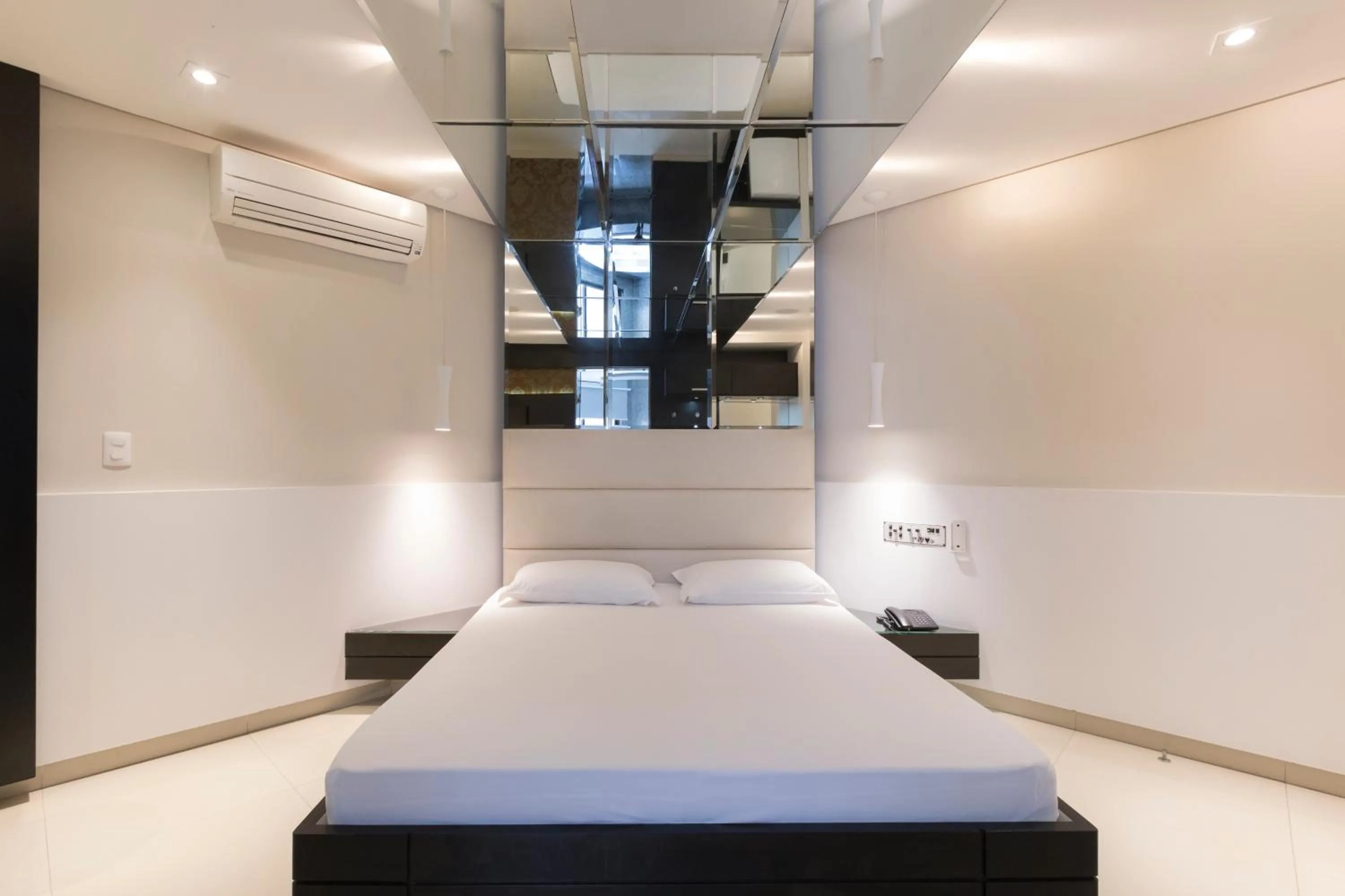 Bed in Poeme Motel by Drops