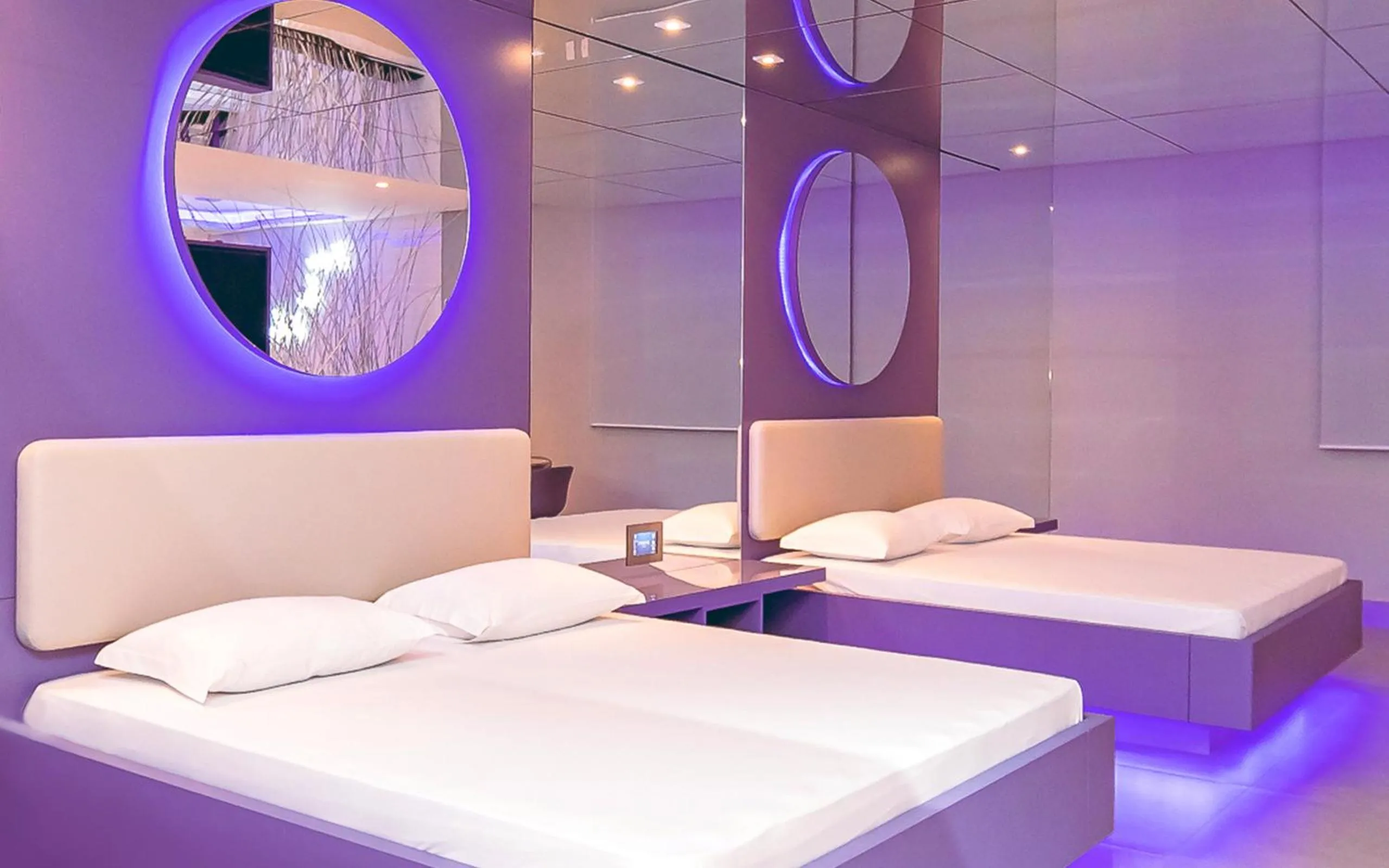 Bed in Poeme Motel by Drops