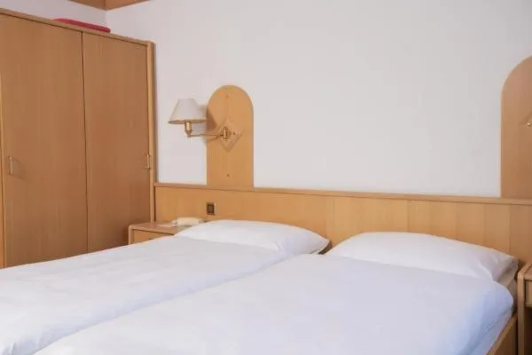 Bed in Hotel Monte-Moro