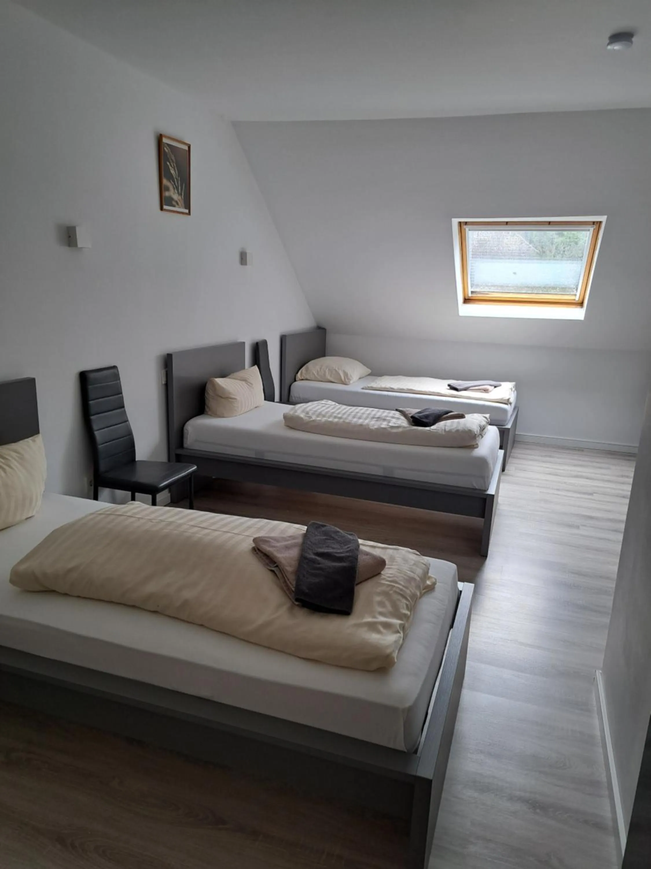 Photo of the whole room, Bed in Landhotel Laarmann