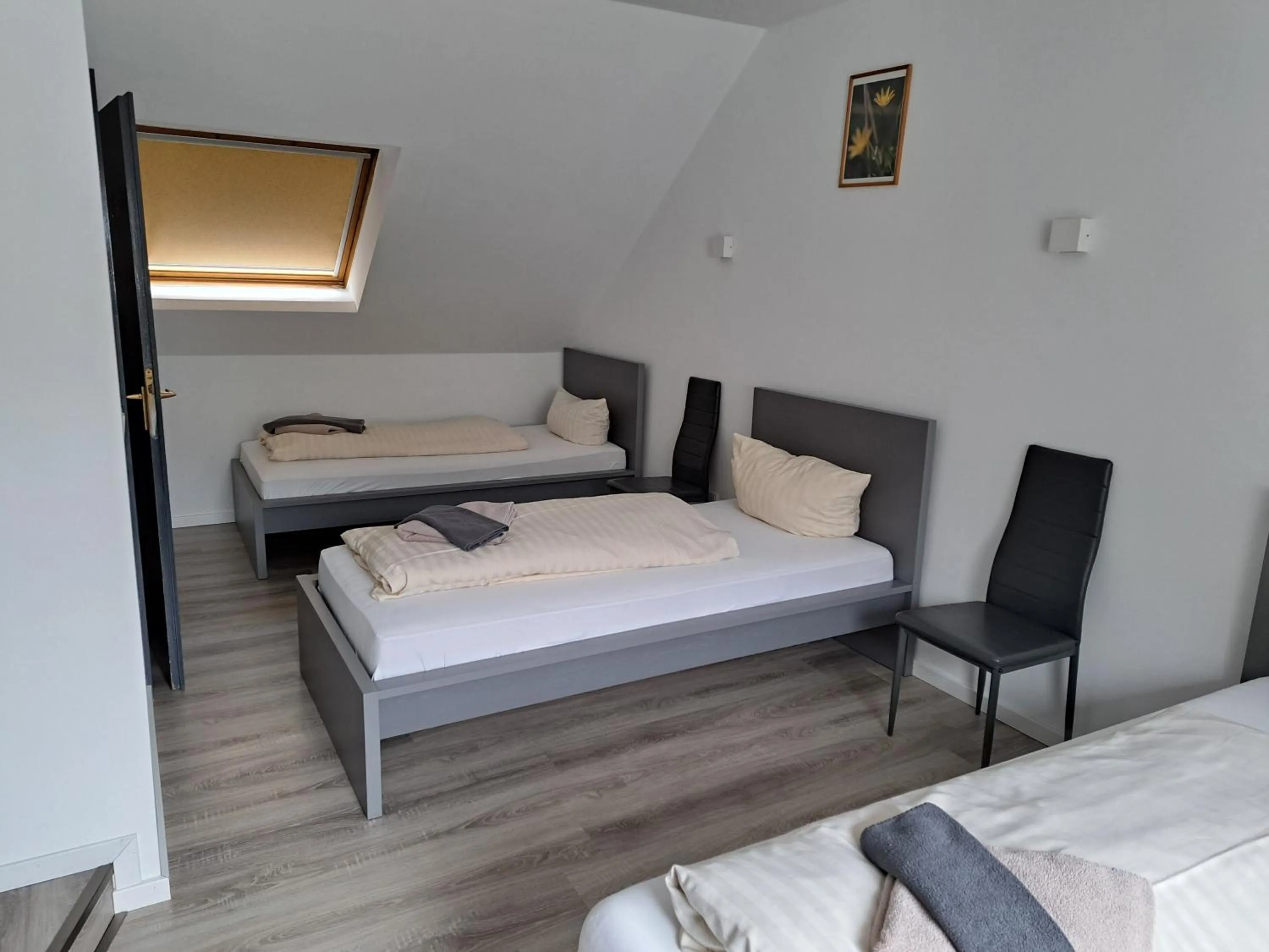 Photo of the whole room, Bed in Landhotel Laarmann