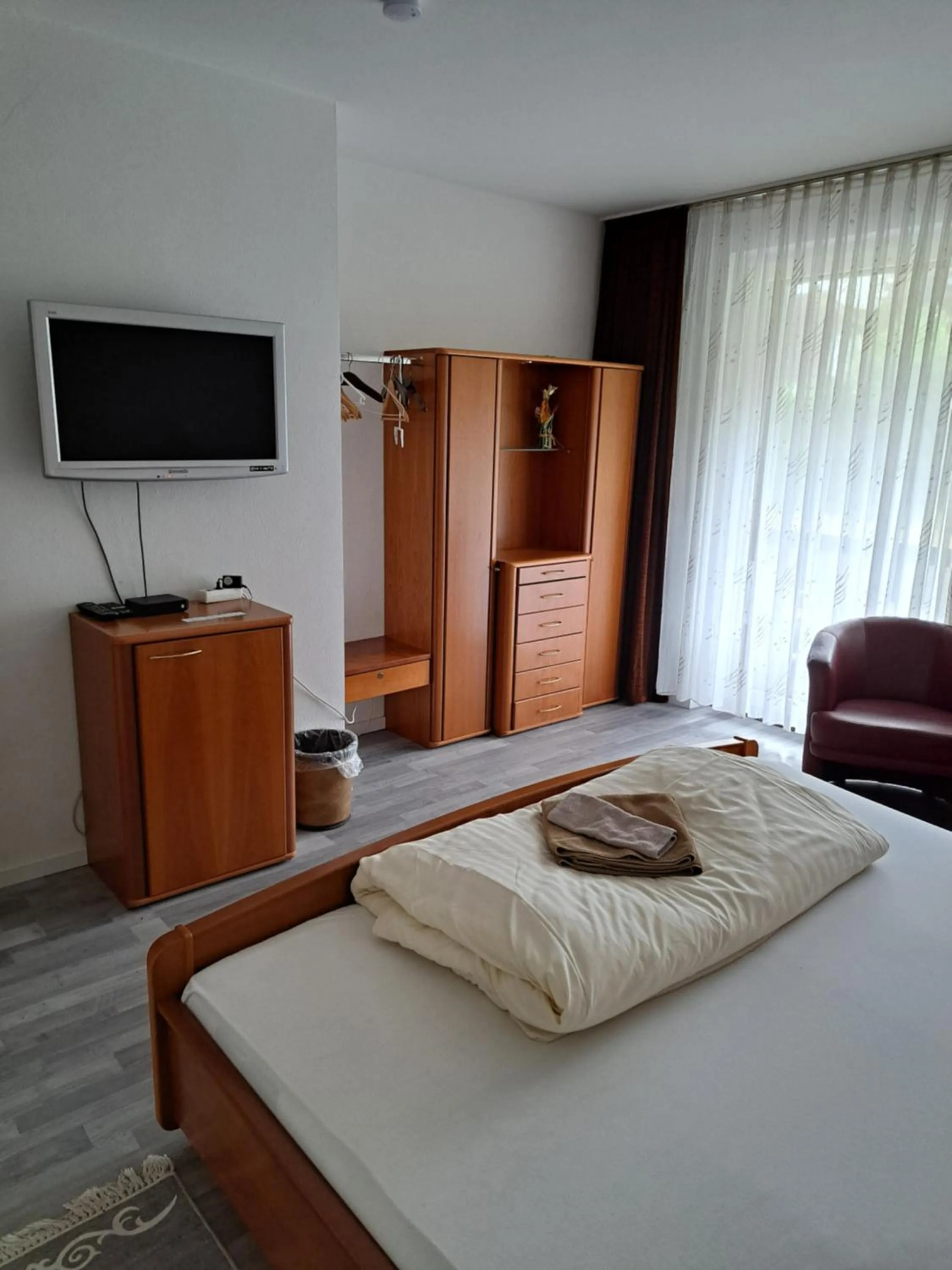 Photo of the whole room, Bed in Landhotel Laarmann