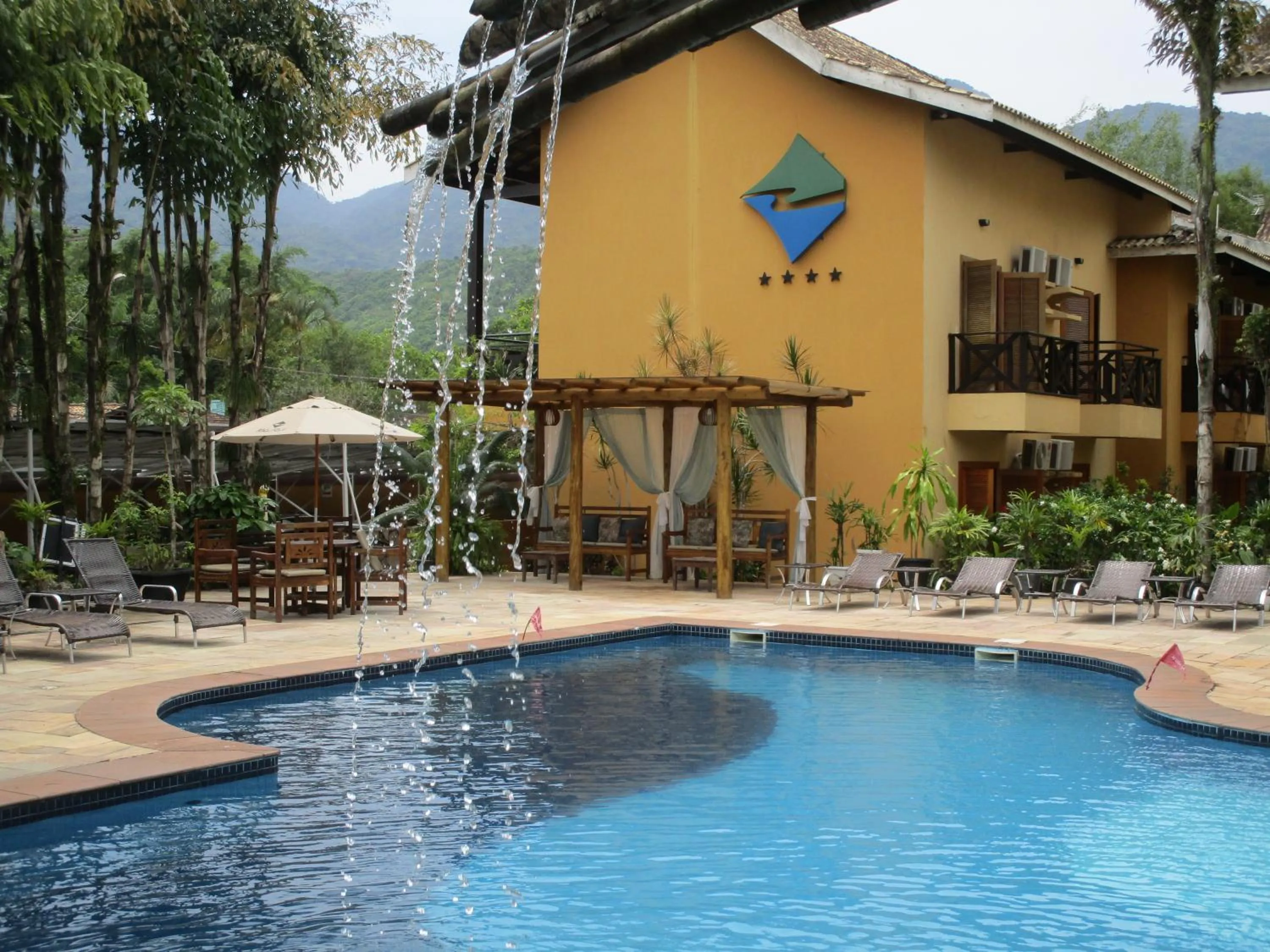 Swimming pool in Ilha flat Hotel Suíte Swaenen II
