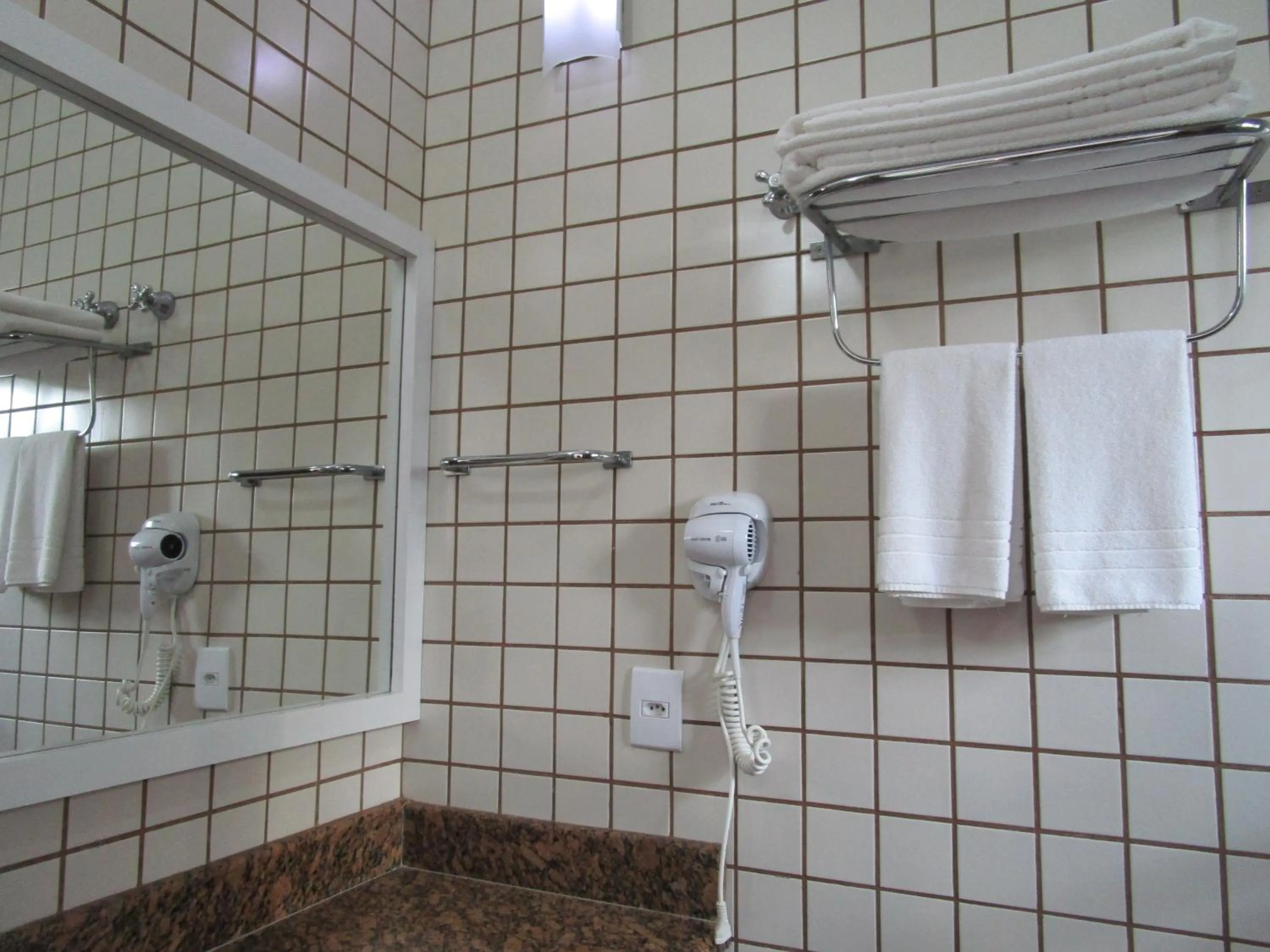 Bathroom in Ilha flat Hotel Suíte Swaenen II