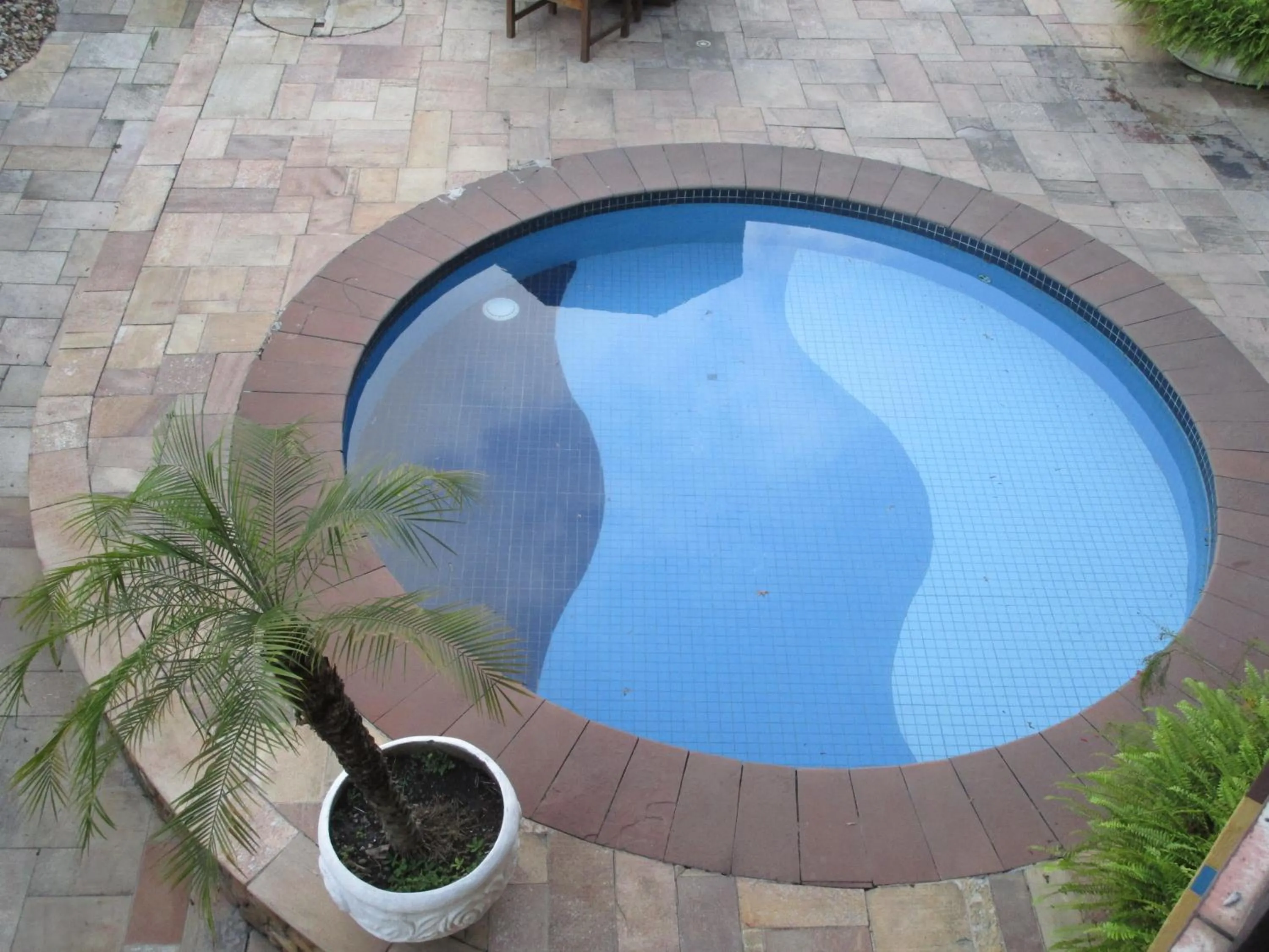 Swimming pool in Ilha flat Hotel Suíte Swaenen II