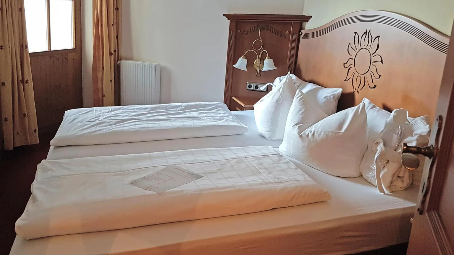 Photo of the whole room, Bed in Alpenhotel Oberstdorf - ein Rovell Hotel