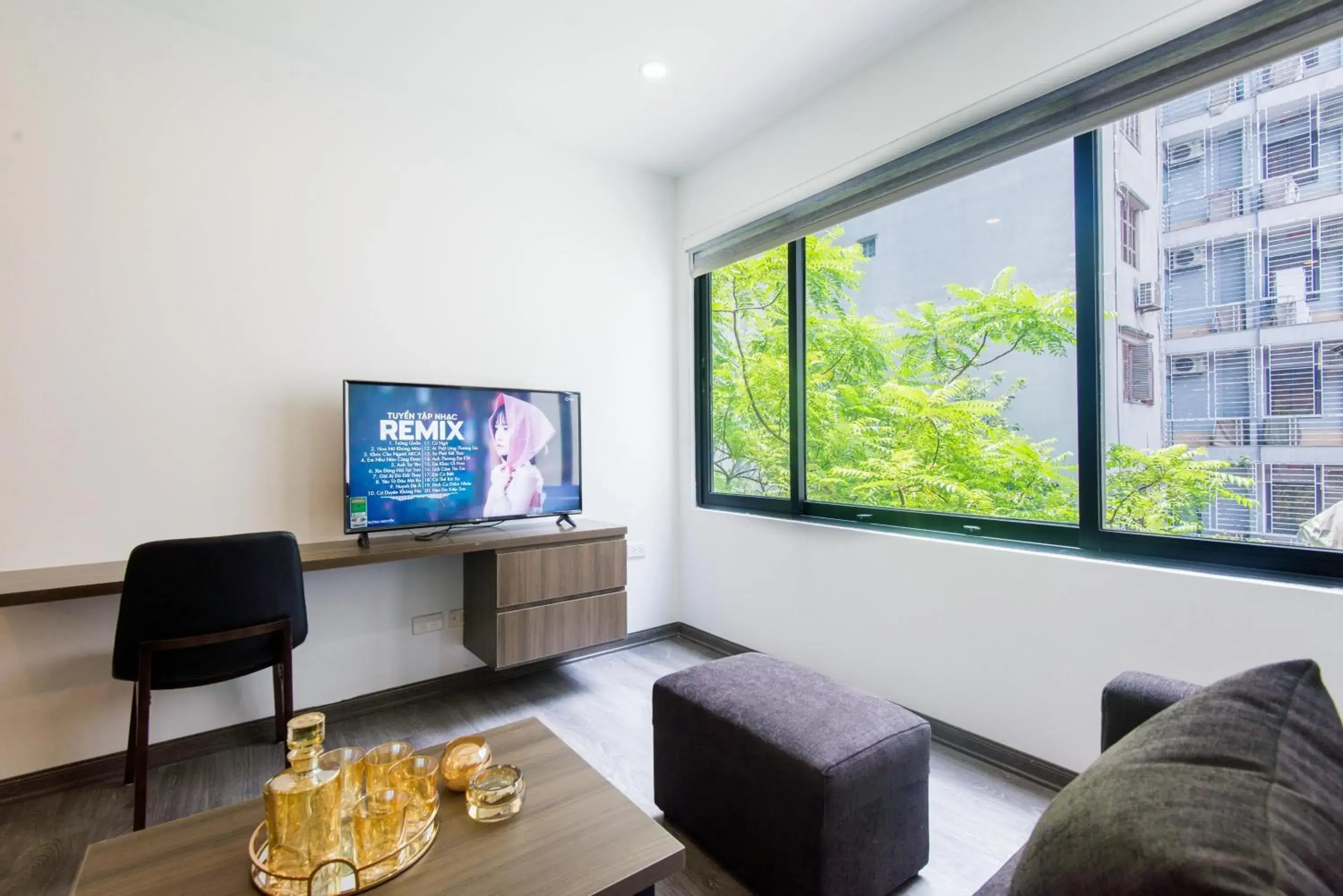 Communal lounge/ TV room in 22housing Hotel 20 Linh Lang Communal lounge/ TV room in 22housing Hotel 20 Linh Lang