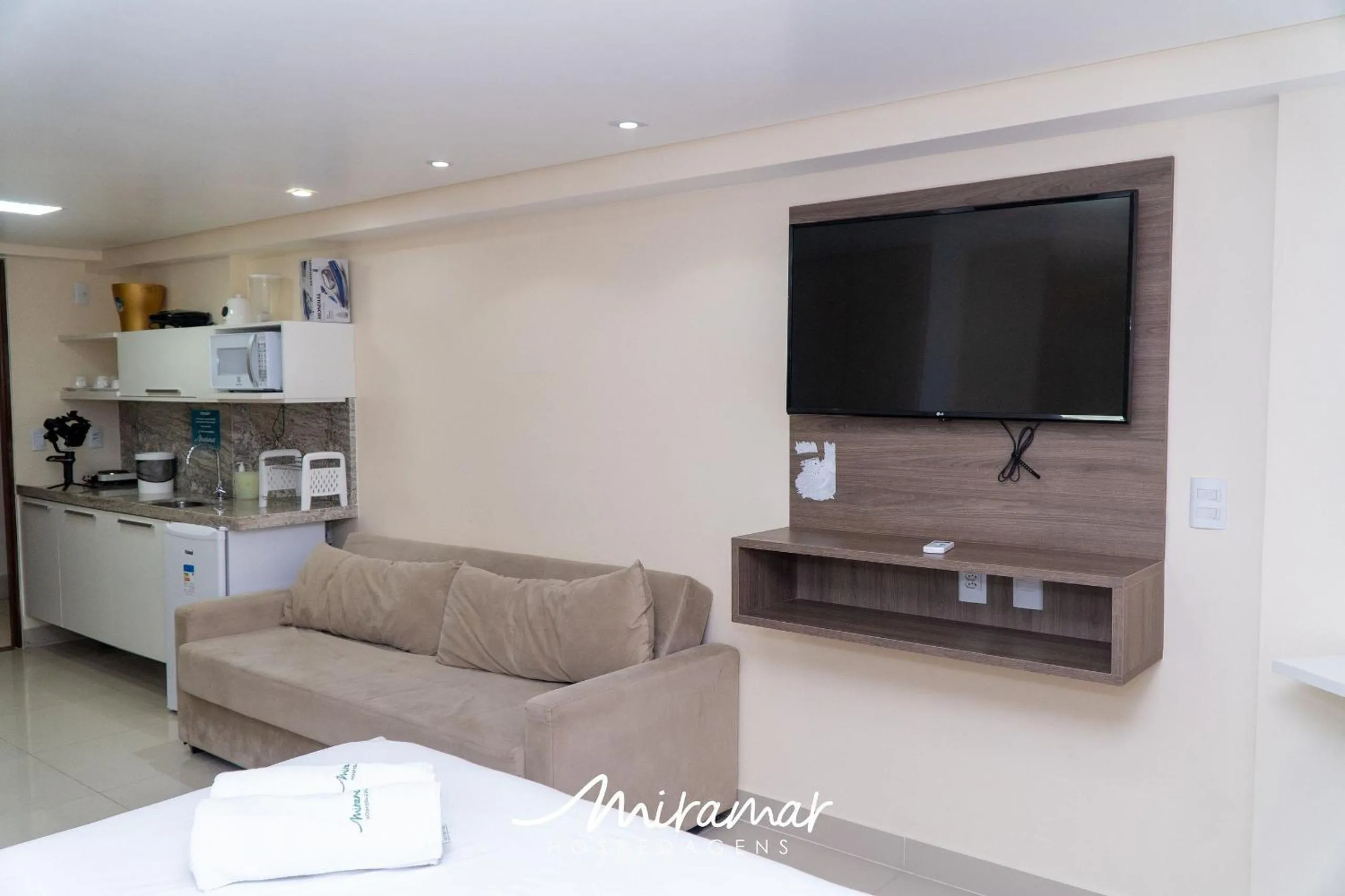 Living room in Gold Flat - Miramar Hospedagens