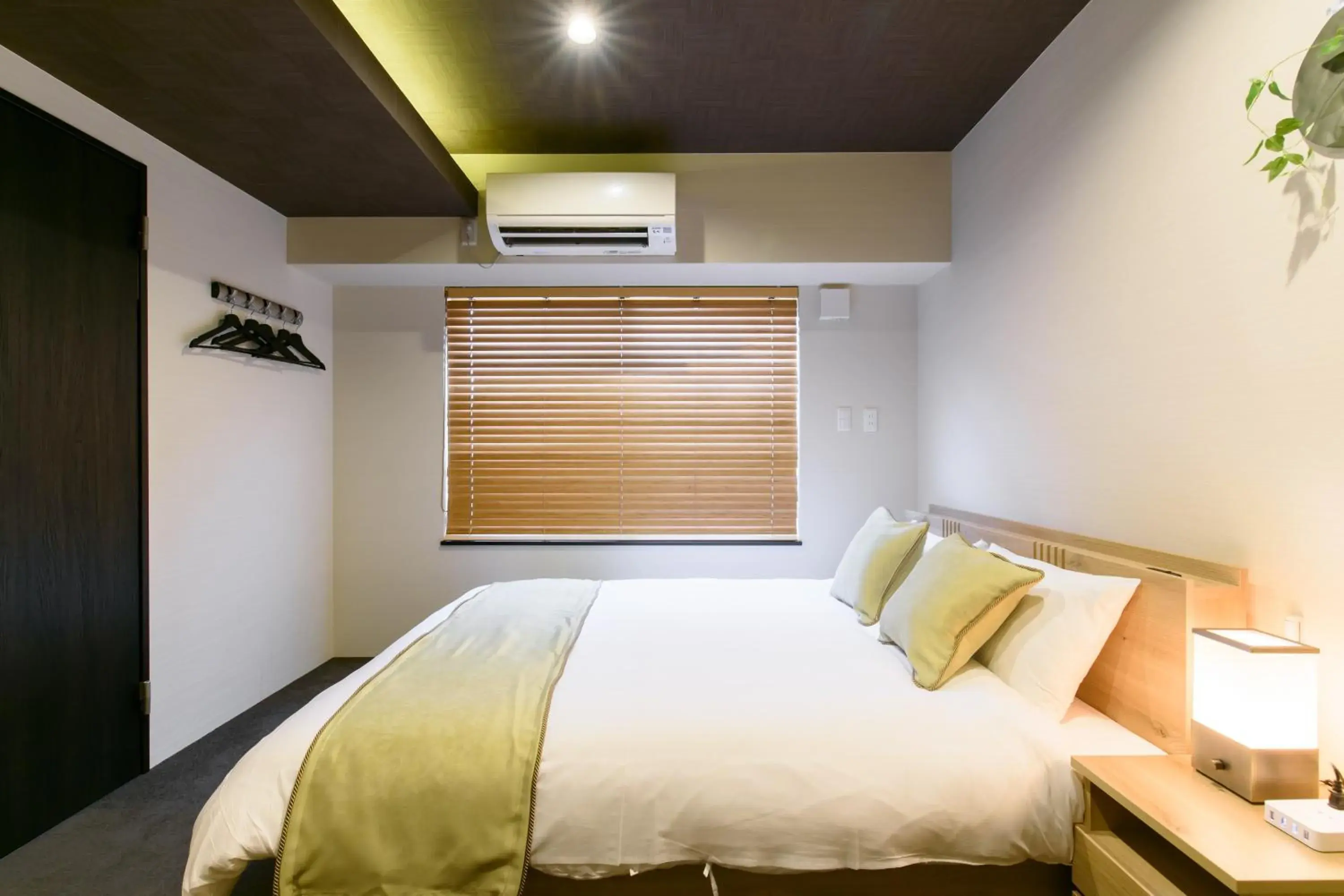 Bed in JP INN Kyoto Ekimae Mongakucho Bed in JP INN Kyoto Ekimae Mongakucho