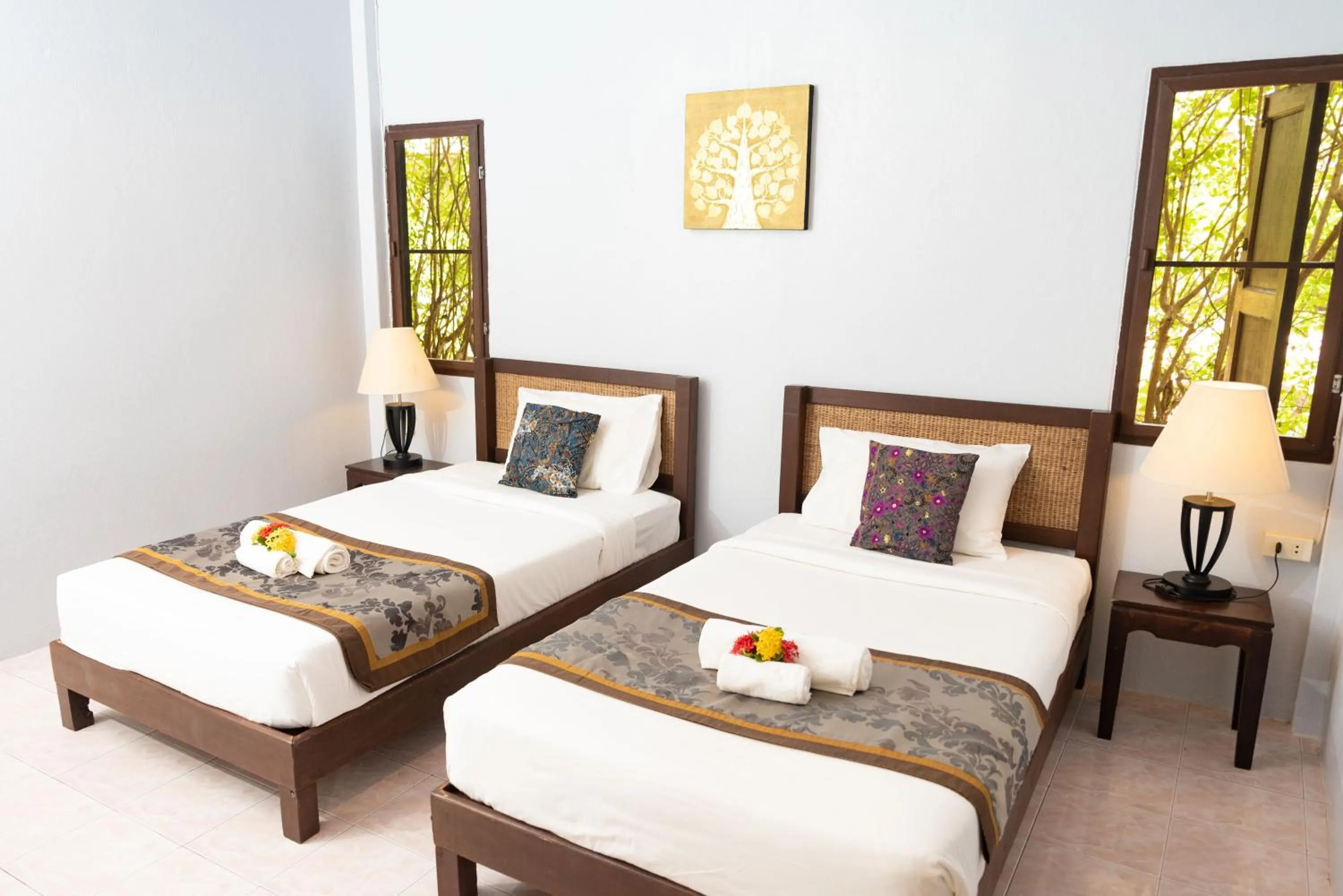 Bed in Satva Samui Yoga and Wellness Resort