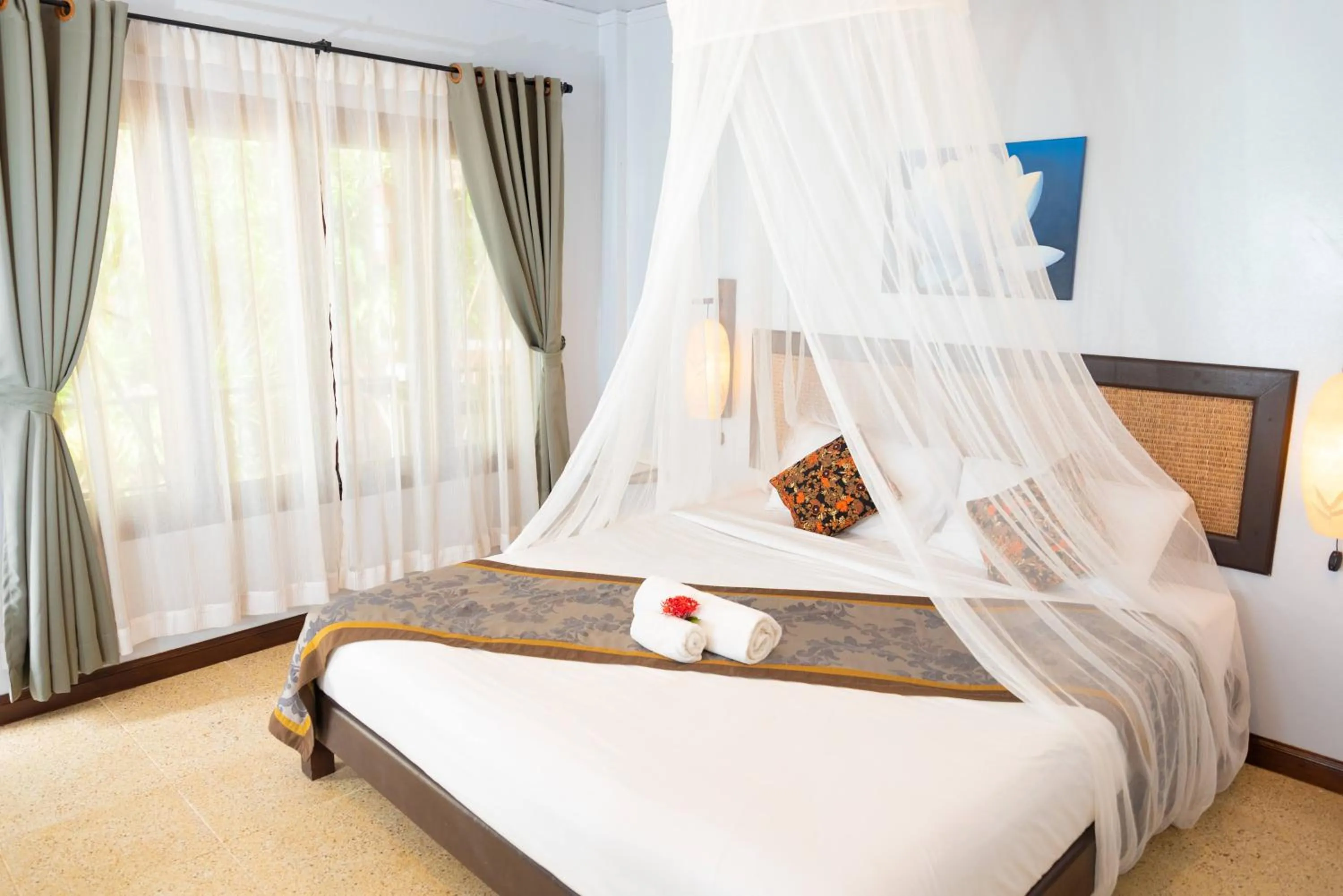 Bed in Satva Samui Yoga and Wellness Resort