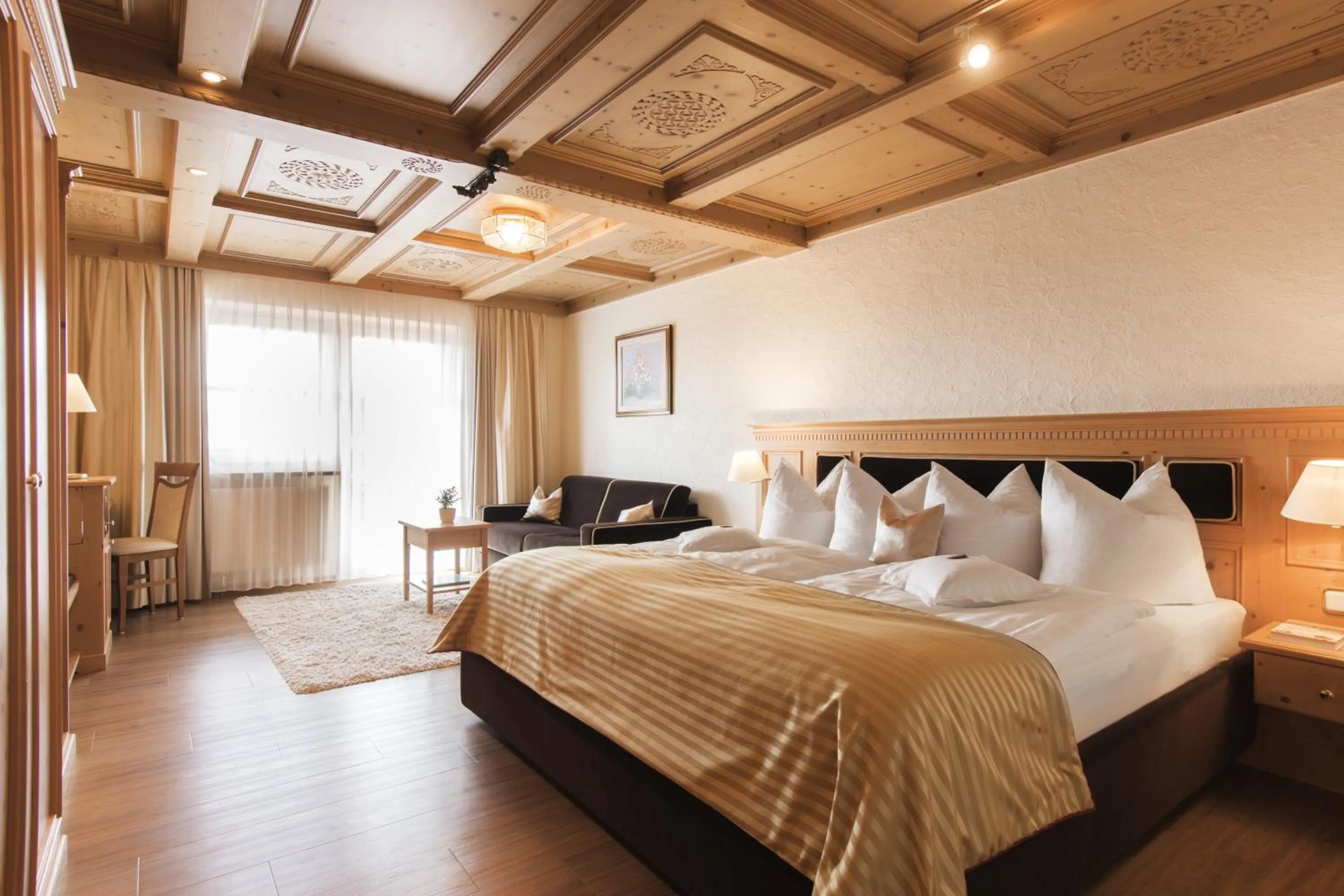 Photo of the whole room, Bed in Wellnesshotel Oswald