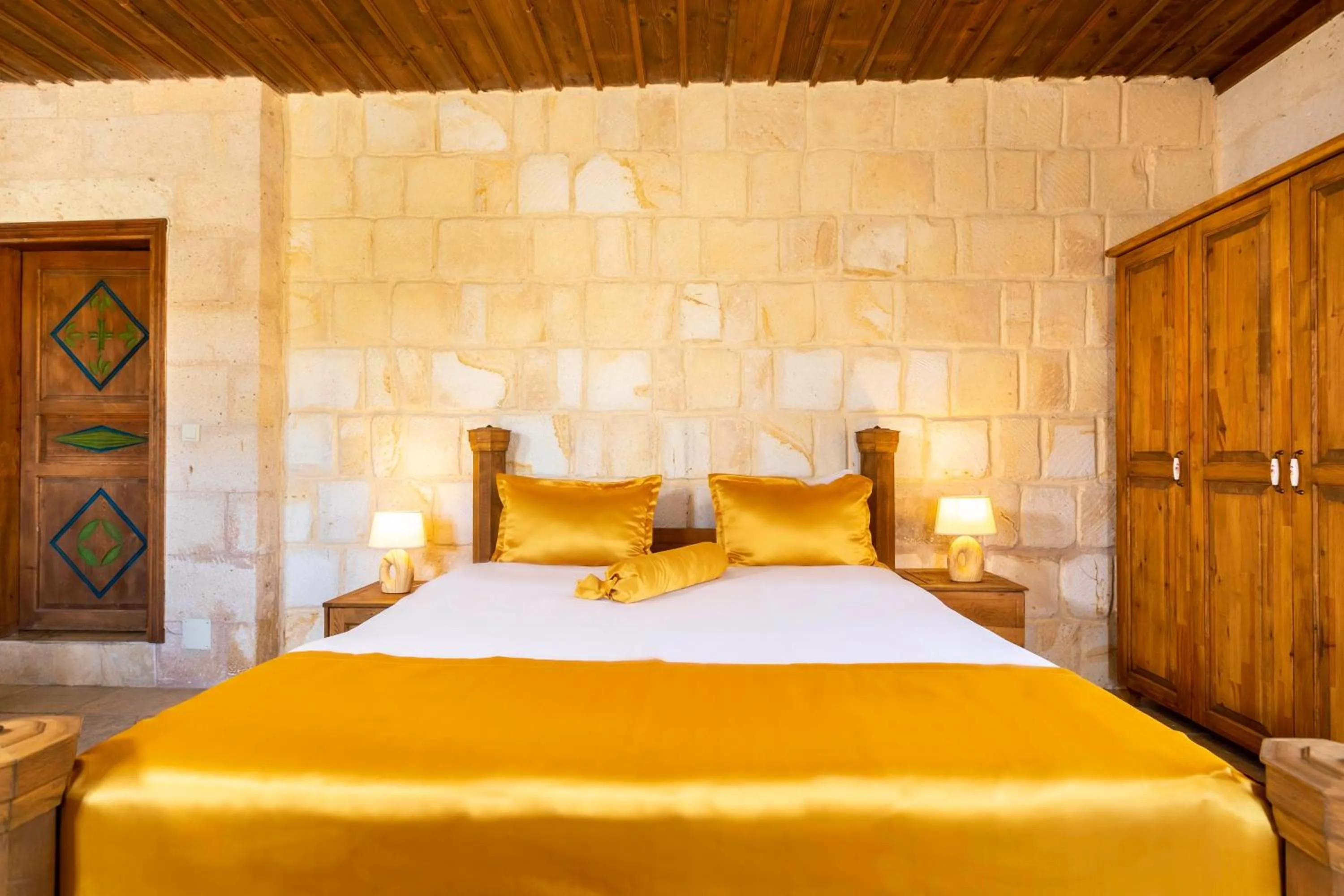 Bed in Helen Cave Suites