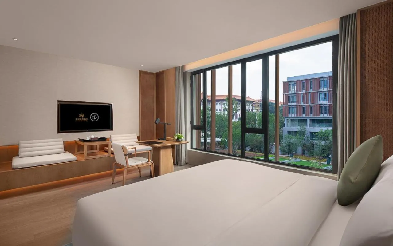 Bed in Grand WUJI Hotel, in The Unbound Collection by Hyatt