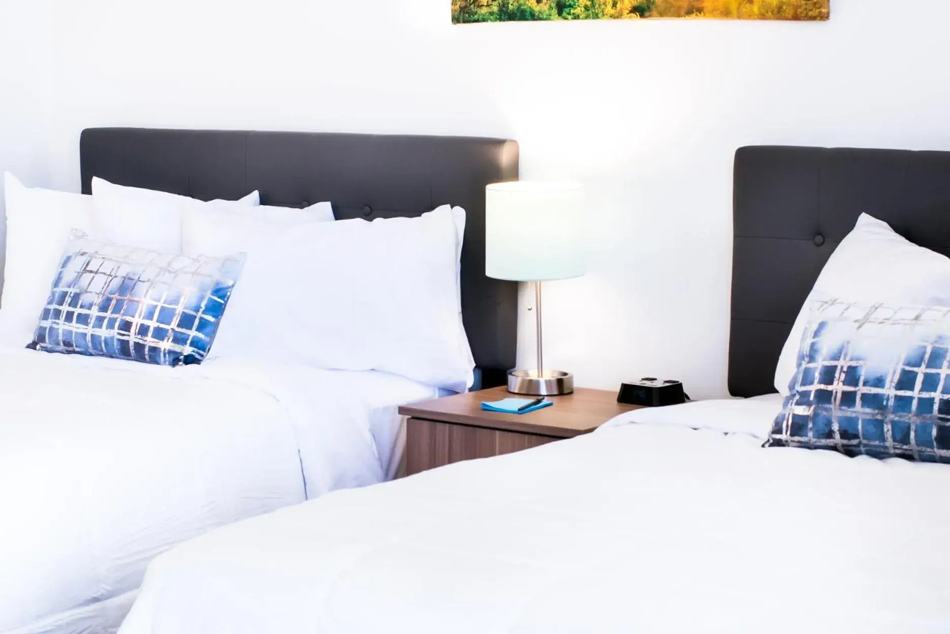 Bed in Blue Sage Inn & Suites Bed in Blue Sage Inn & Suites