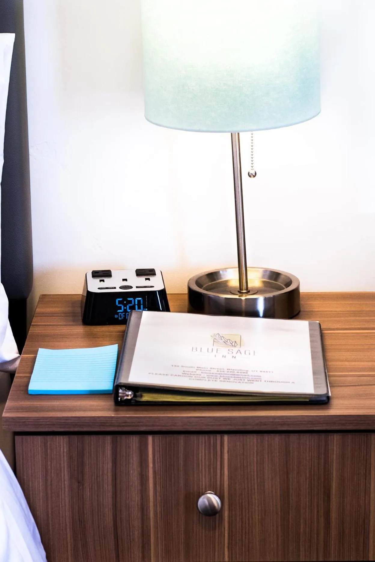 Bed in Blue Sage Inn & Suites