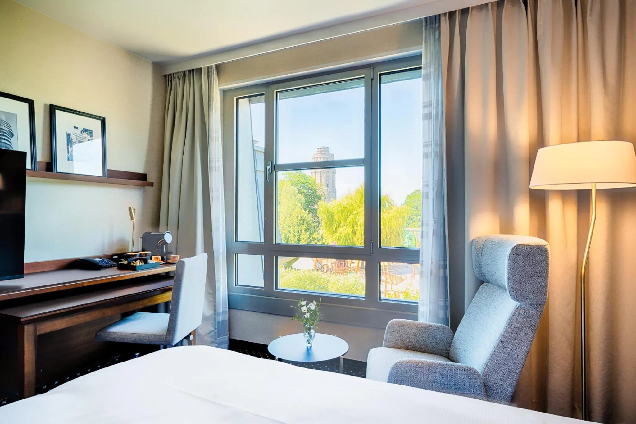 Seating area, Bed in Welcome Parkhotel Bochum