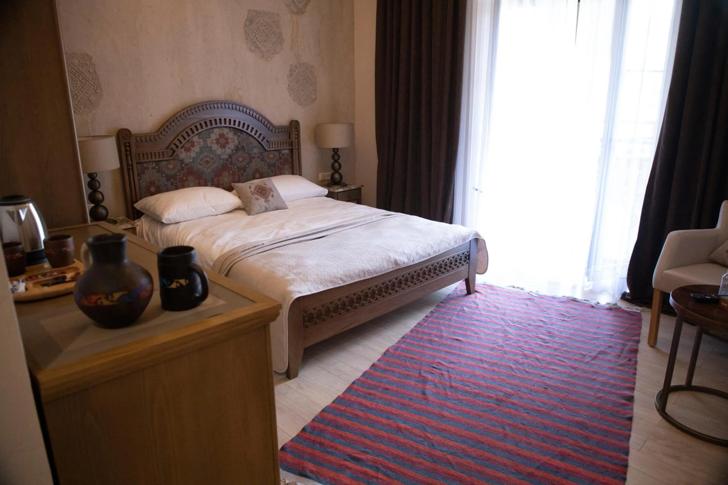 Bed in Boutique ETHNO HOTEL