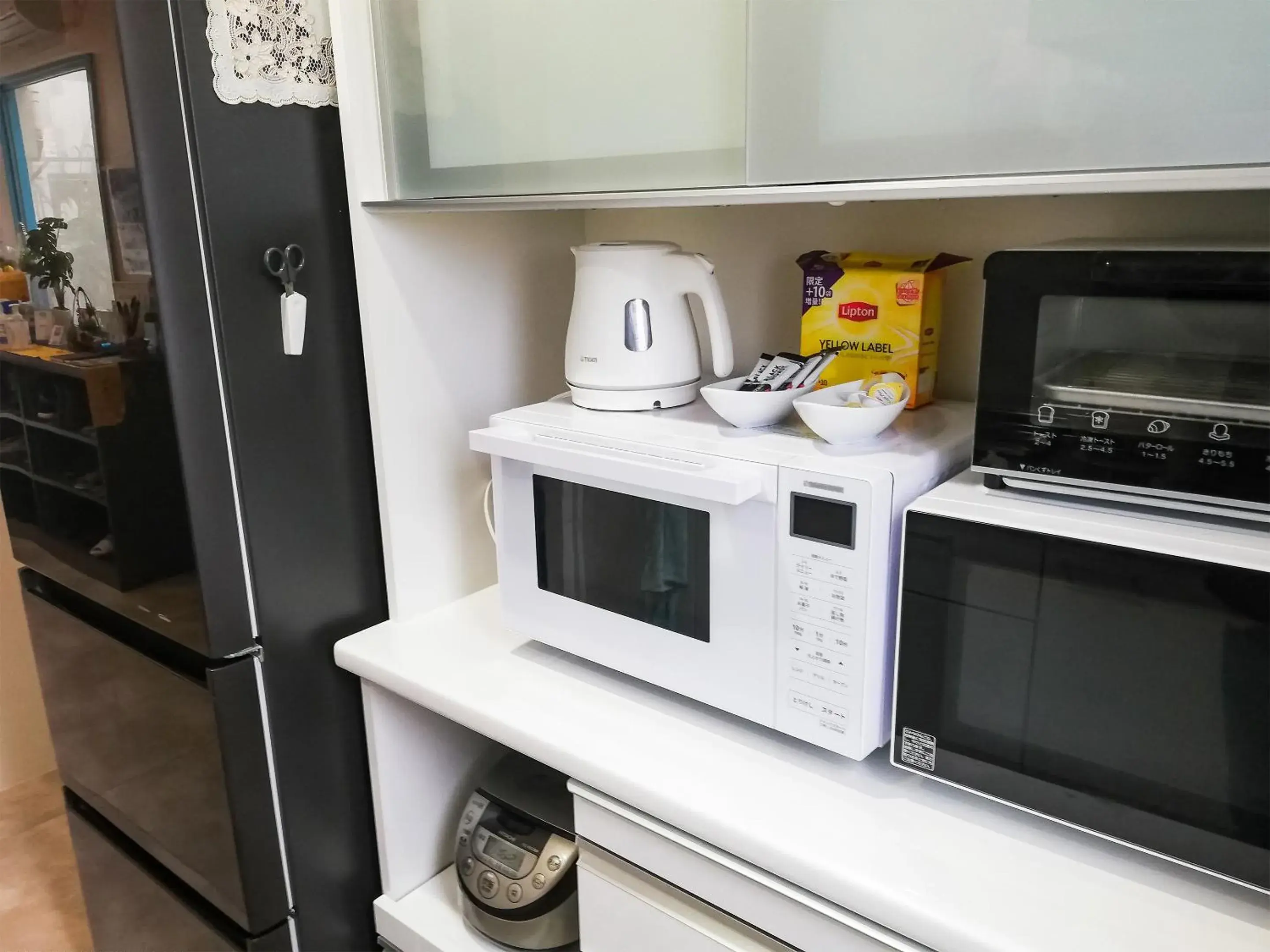 Communal kitchen in Room Biotop YOMITAN Communal kitchen in Room Biotop YOMITAN