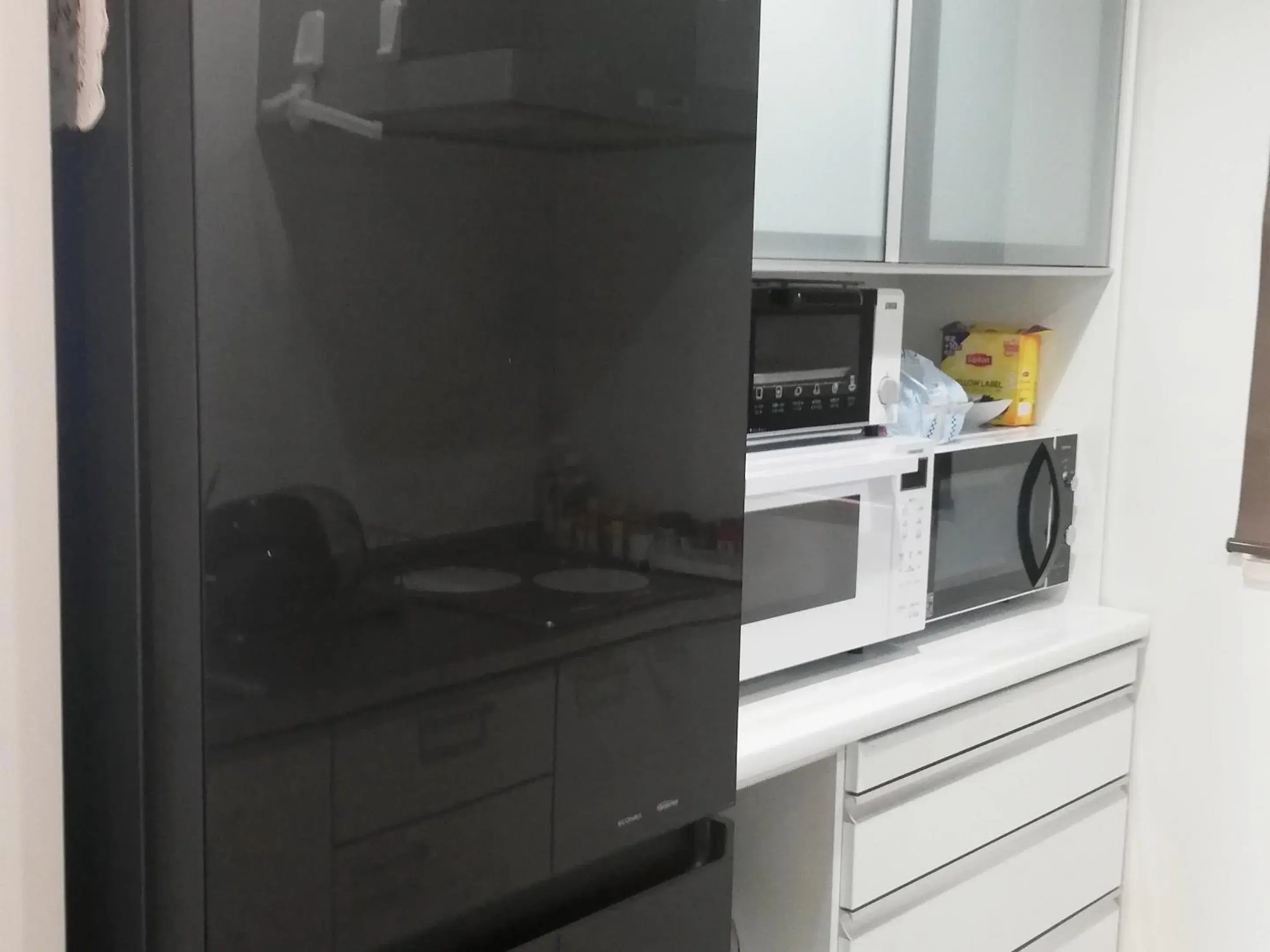 Communal kitchen in Room Biotop YOMITAN Communal kitchen in Room Biotop YOMITAN