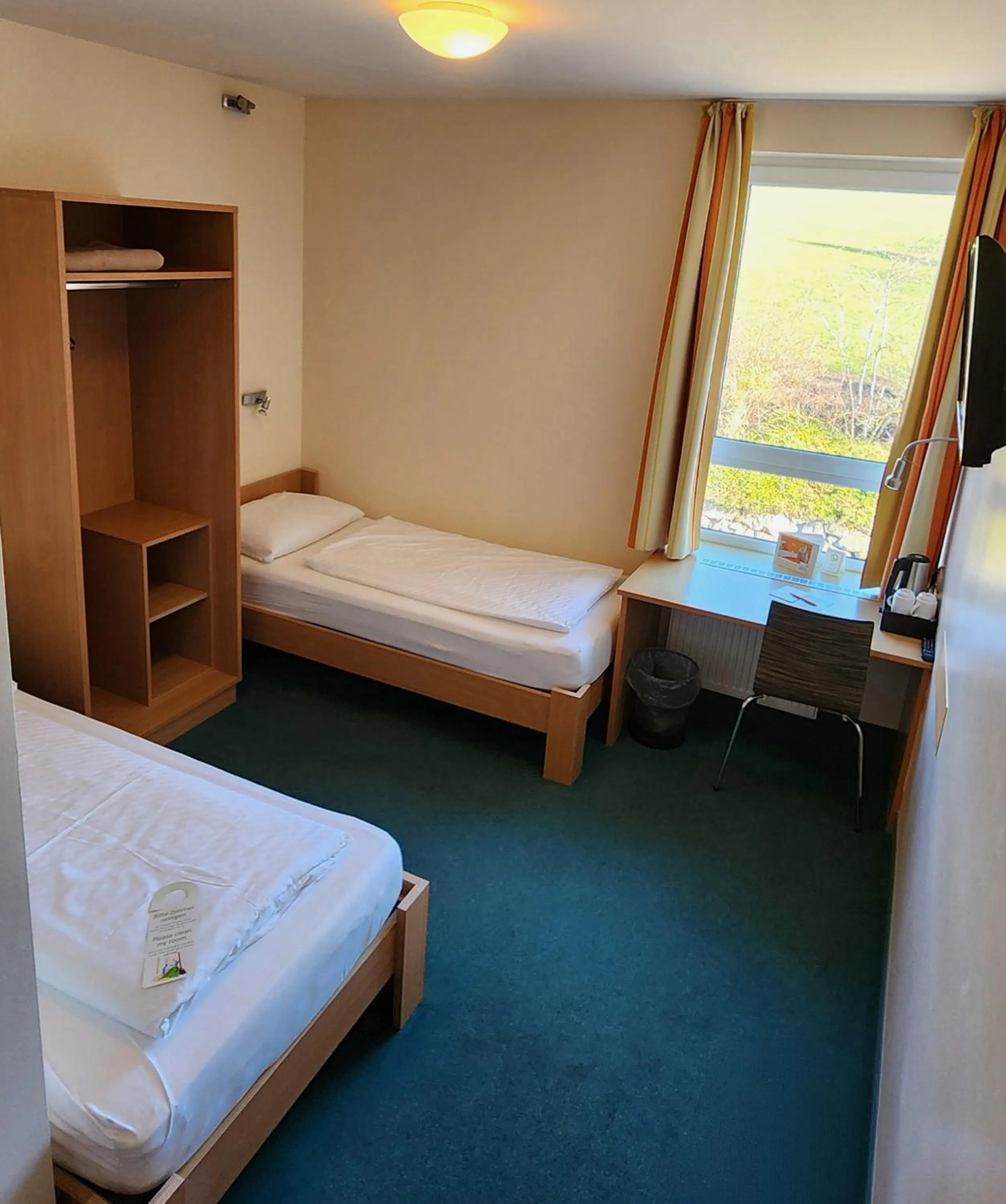 Photo of the whole room, Bed in smartMotel