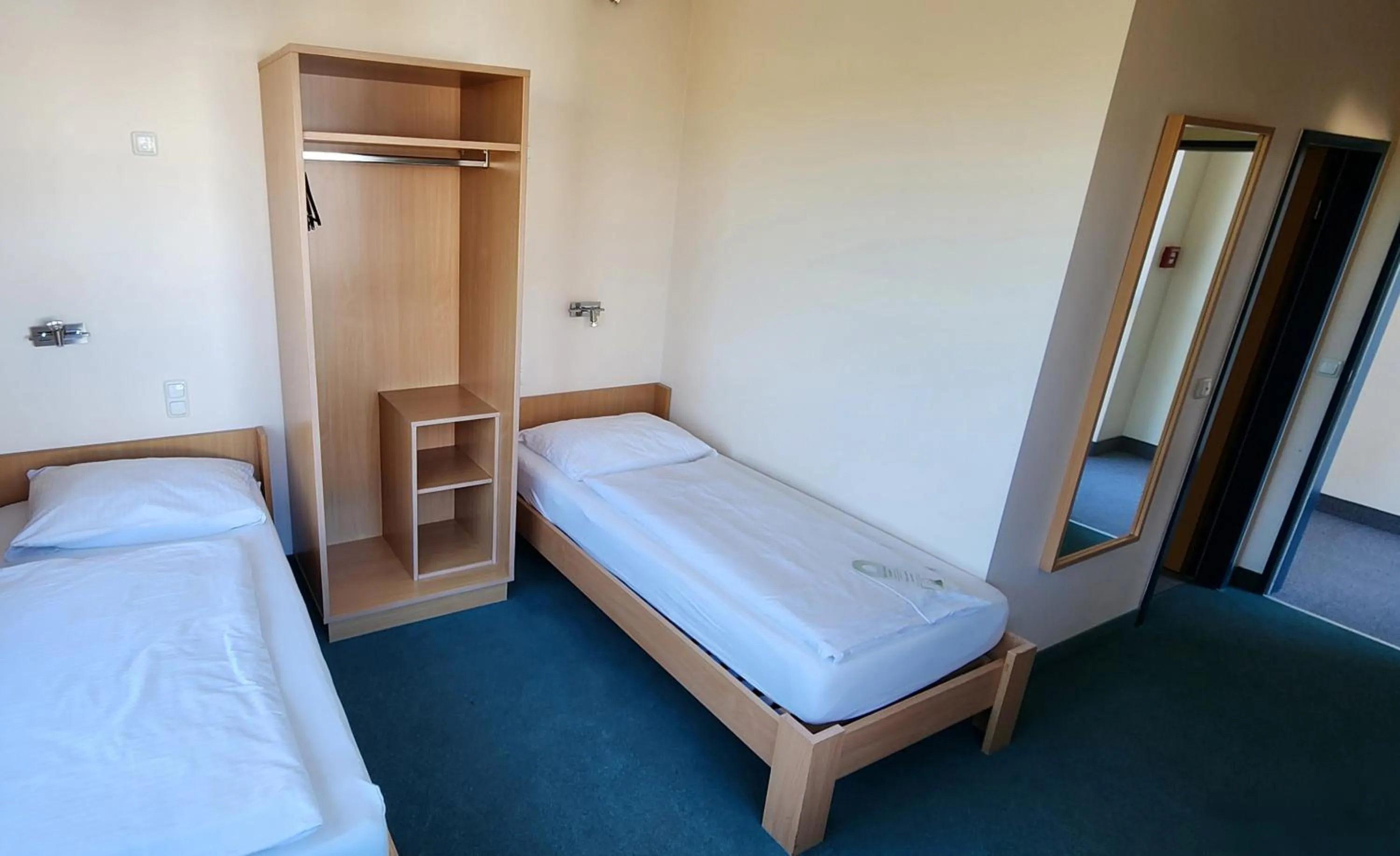 Photo of the whole room, Bed in smartMotel