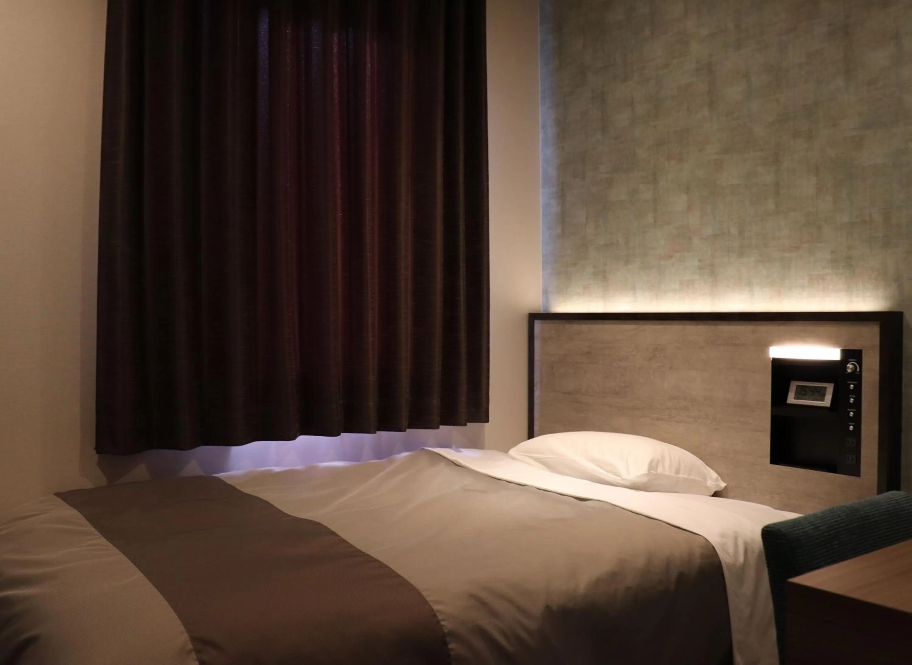 Bed in Tourist Inn Kochi