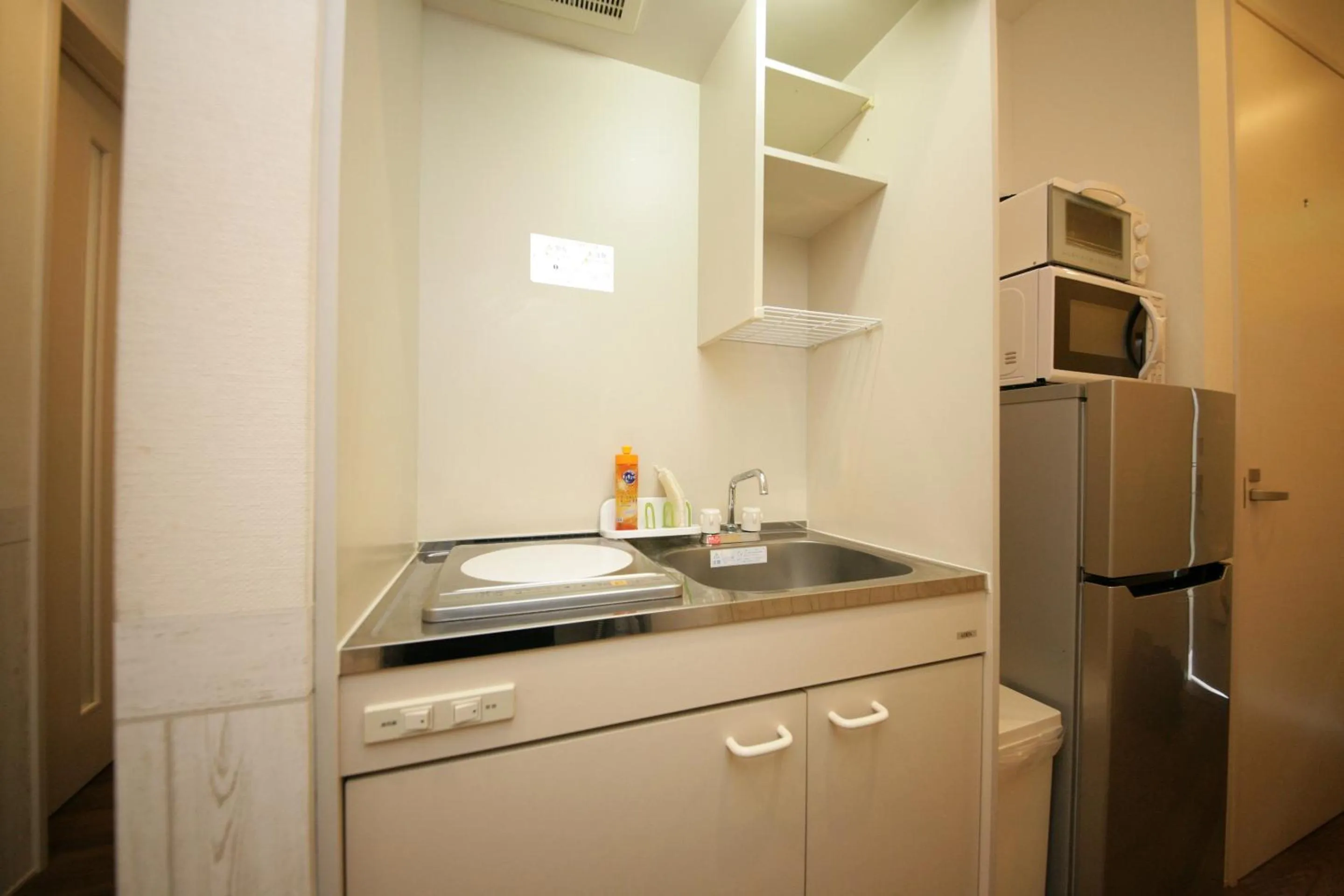 Kitchen or kitchenette in goom Hotel Nakasu R-Tenjin