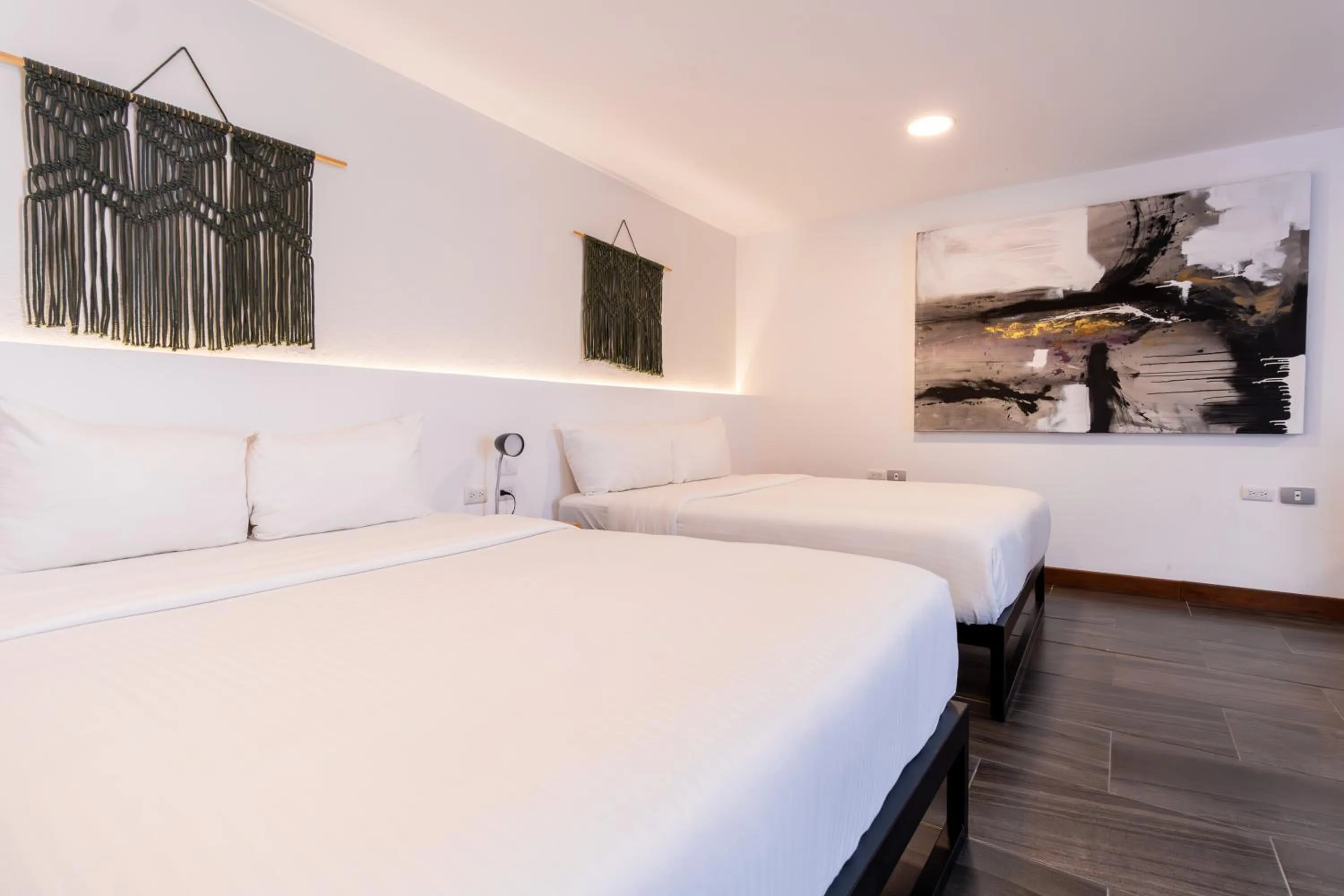 Bed in Urban Puebla by Grupo Amber