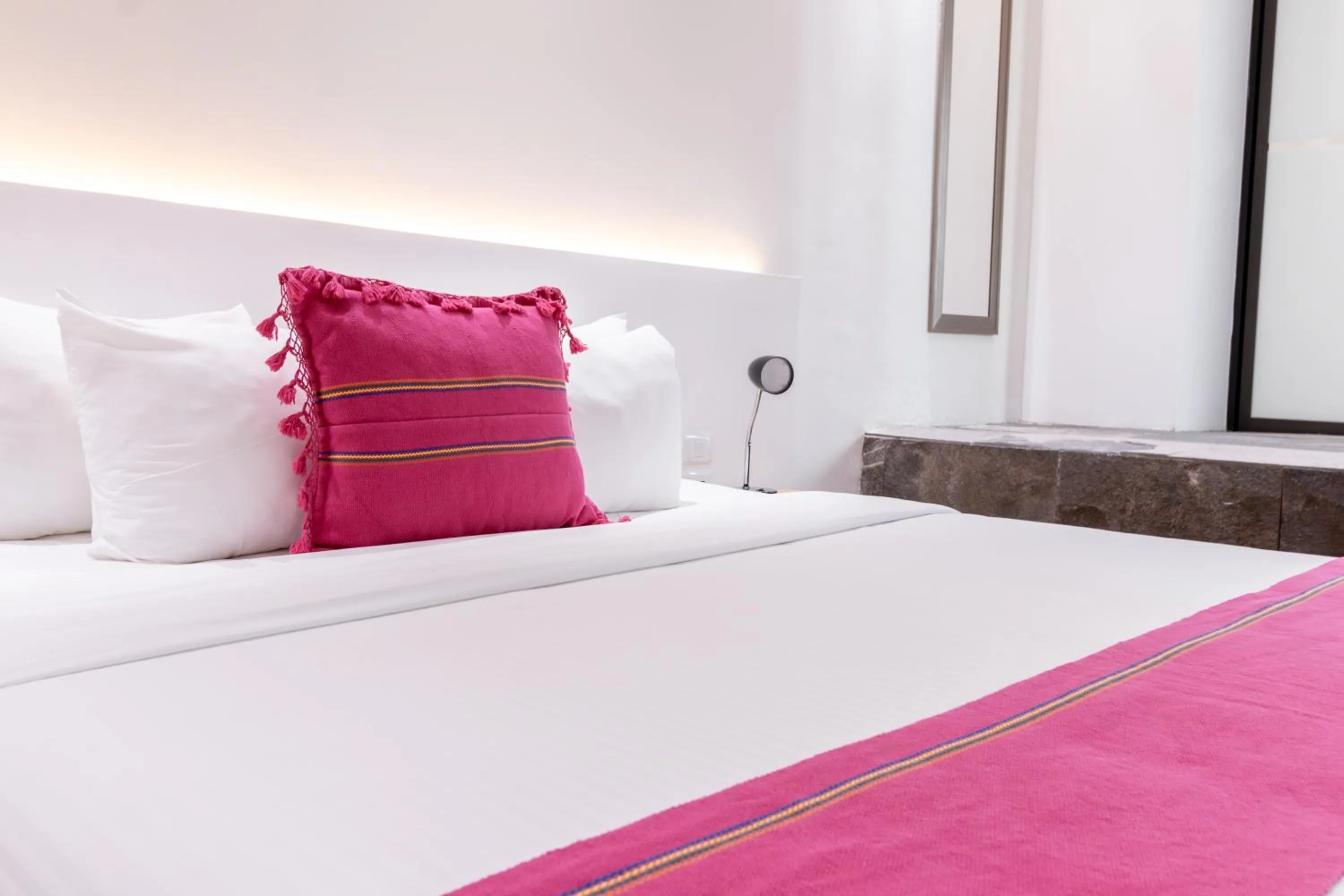 Bed in Urban Puebla by Grupo Amber