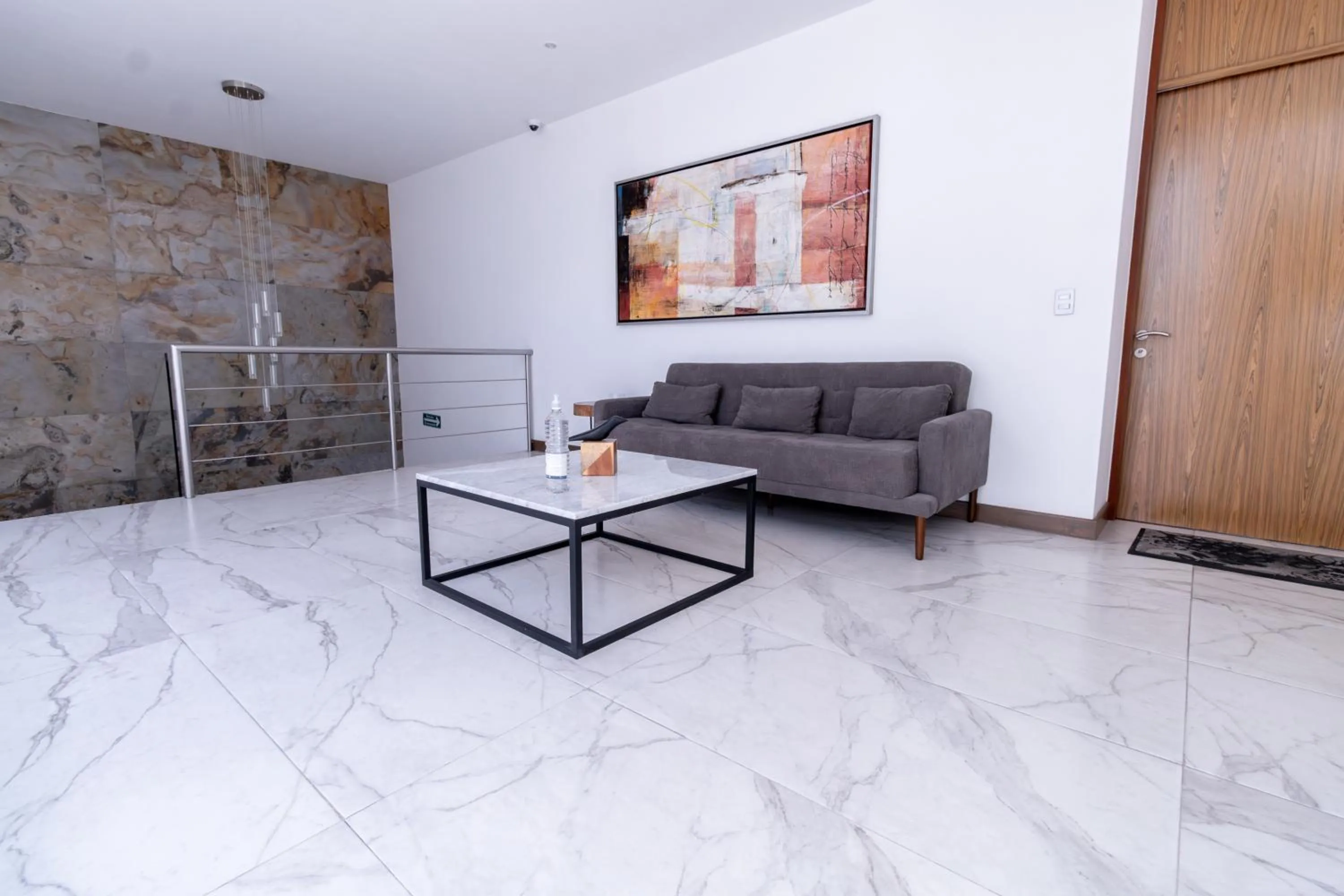 Living room in Urban Puebla by Grupo Amber
