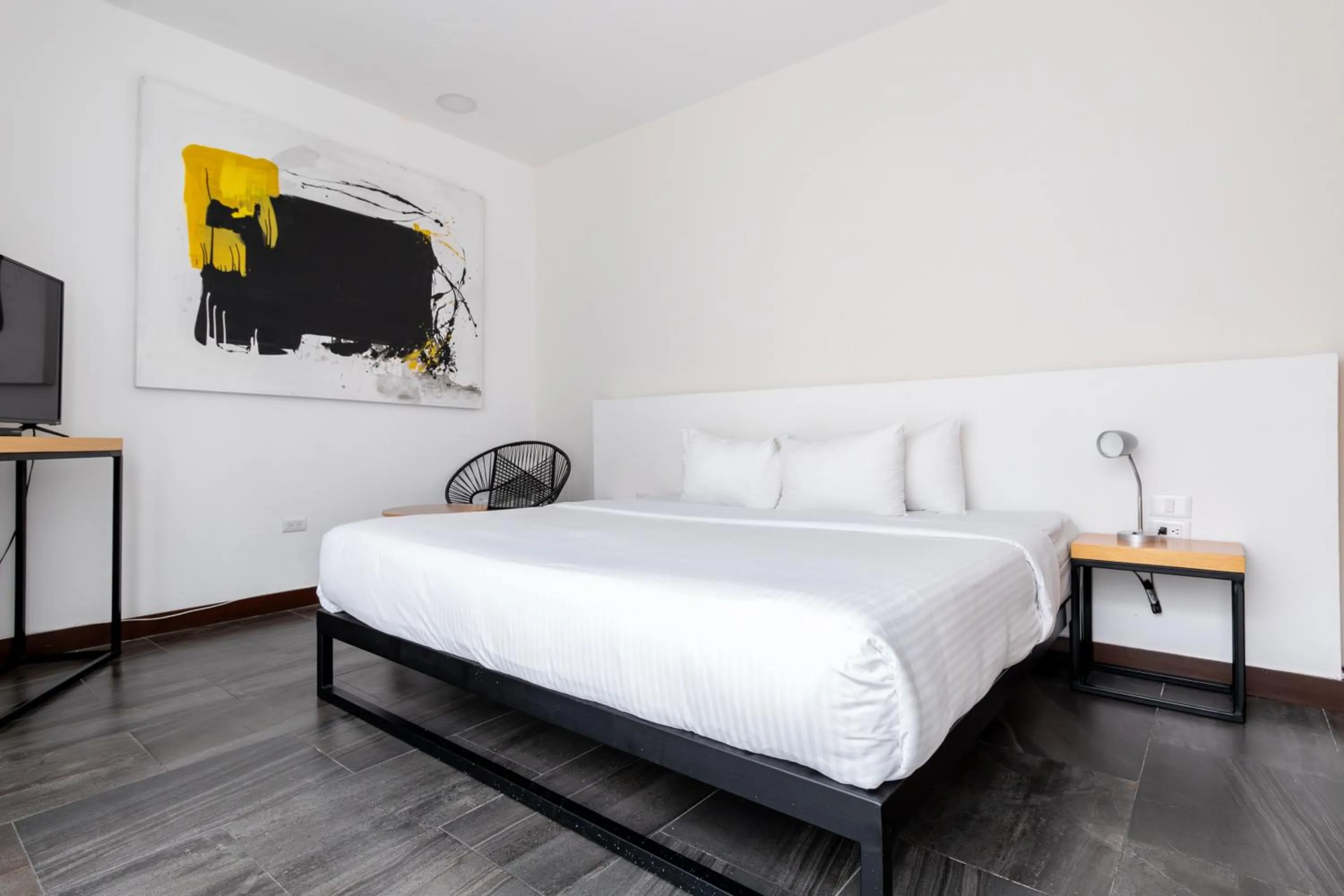 Bed in Urban Puebla by Grupo Amber